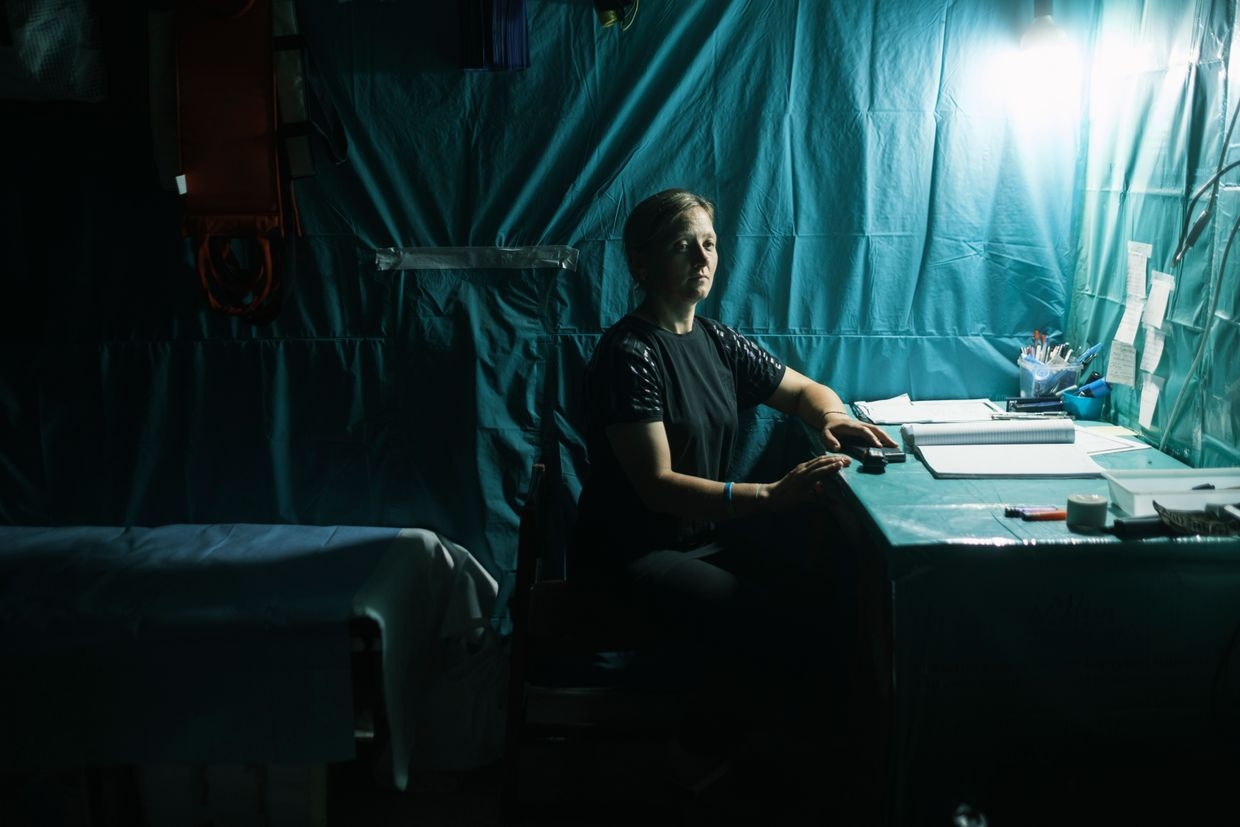 Olena, 38, a senior nurse at the stabilization point of the 110th separate mechanized brigade near the road T0504, in Donetsk region