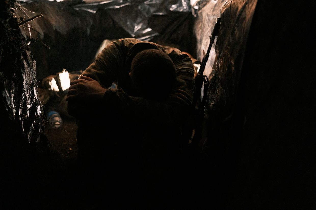 A press officer of the 28th Separate Mechanised Brigade rests in a shelter 2 kilometers from the Russian positions near Toretsk