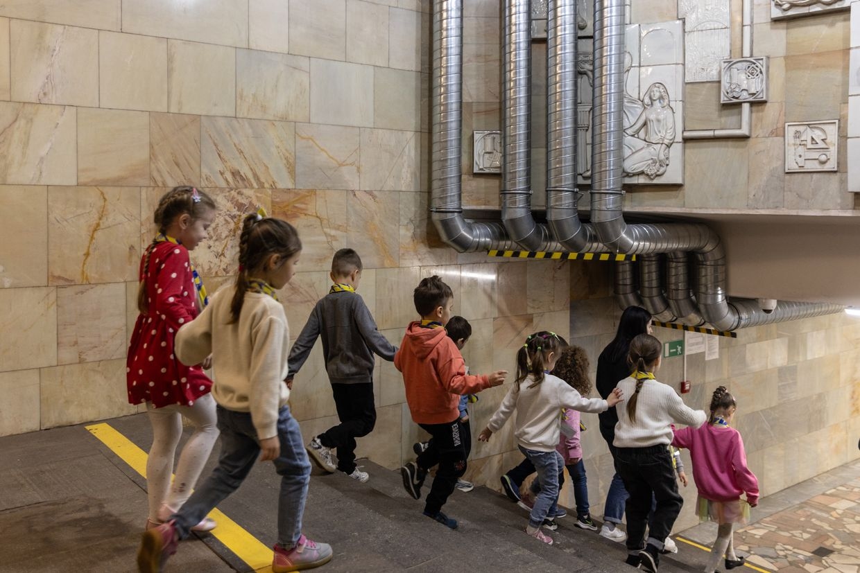 Children take part in preschool classes at the metro station on Svobody Square near the Kharkiv Regional Administration building in Kharkiv, Ukraine, on Feb. 17, 2024. 