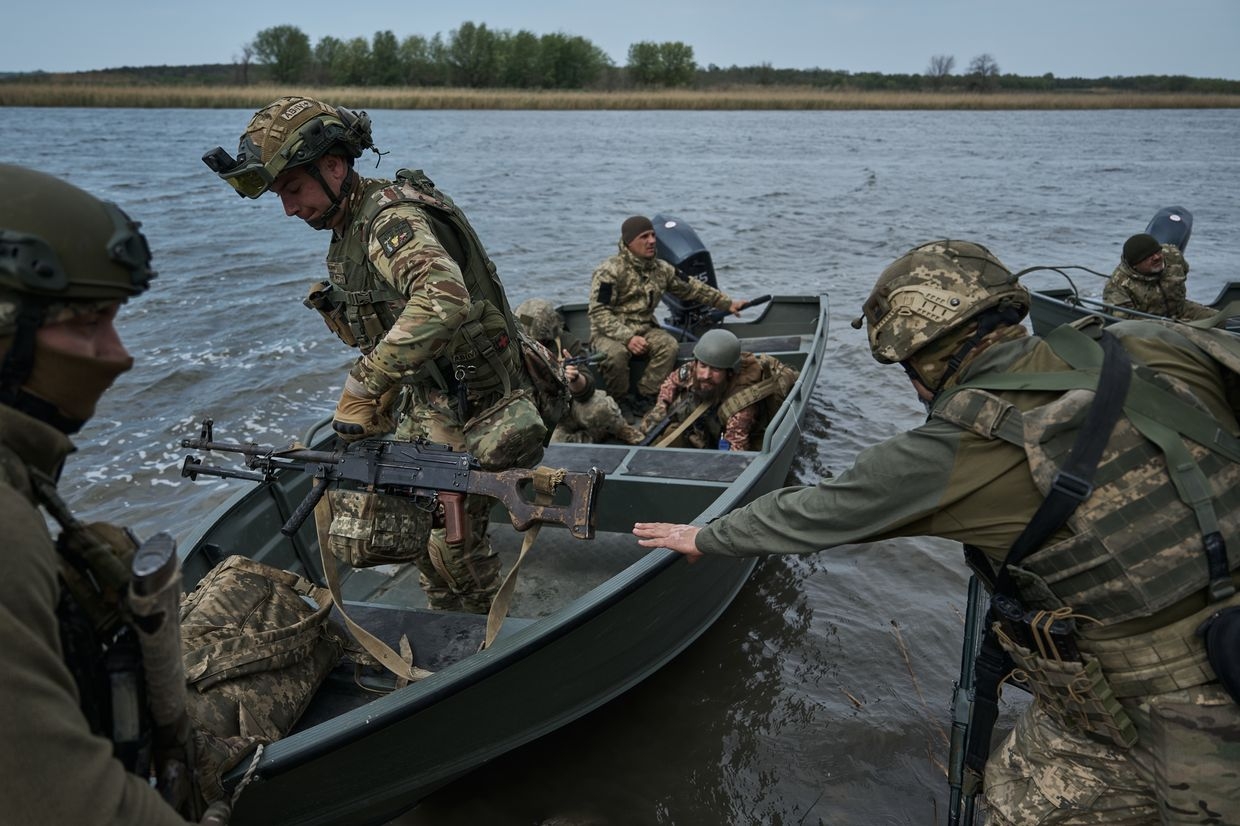  Ukrainian infantrymen from the 126th Territorial Defense Brigade train on boats for combat missions on the Dnipro in Kherson Oblast, Ukraine, on April 16.