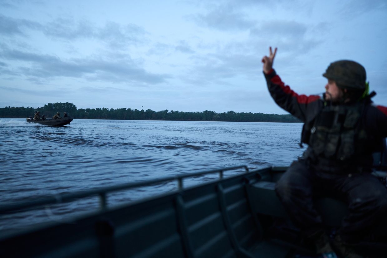 Ukrainian soldiers from the 126th Territorial Defense Brigade return from positions after crossing the Dnipro River near Krynky, Kherson Oblast, Ukraine, on April 21.