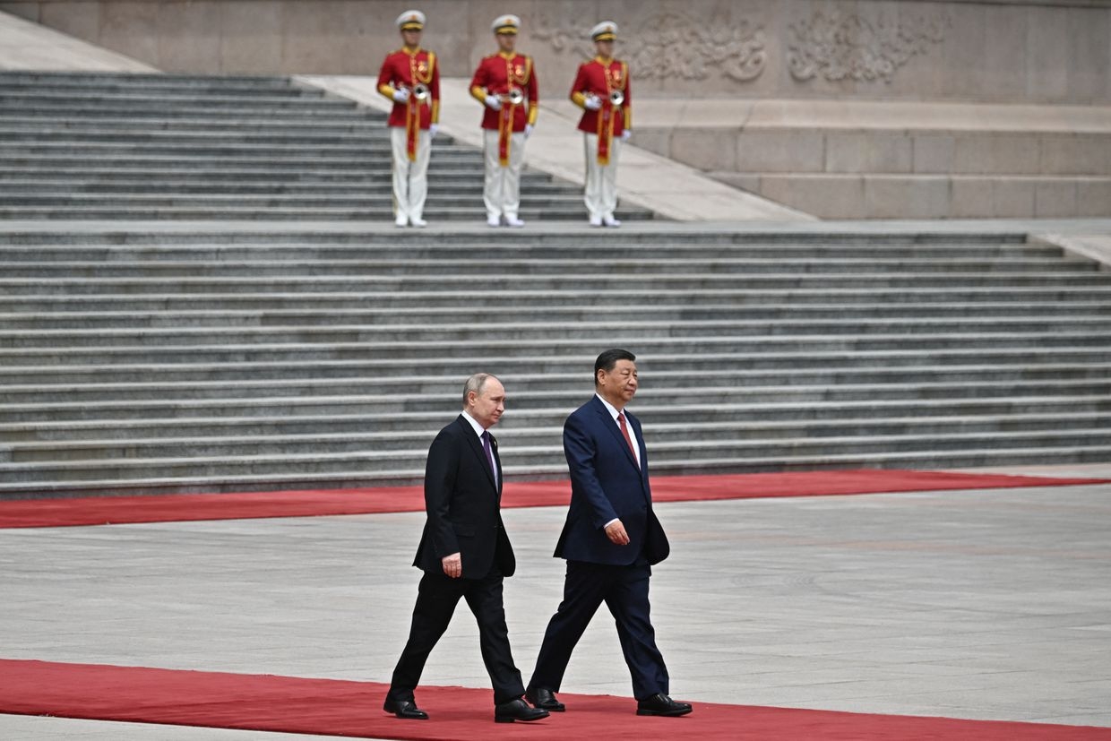  In this pool photo by Russian state agency Sputnik, Vladimir Putin and Xi Jinping attend a ceremony in Tiananmen Square, Beijing, on May 16, 2024.