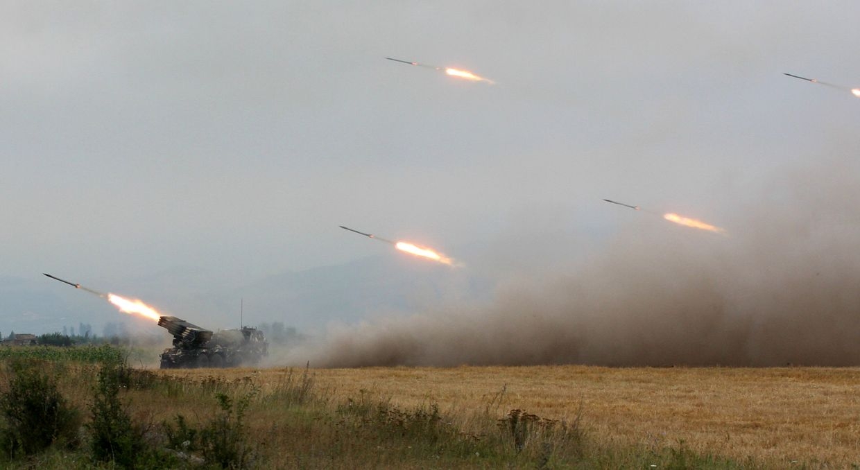 Georgian troops fire rockets near Tskhinvali, Georgia, on Aug. 8, 2008.