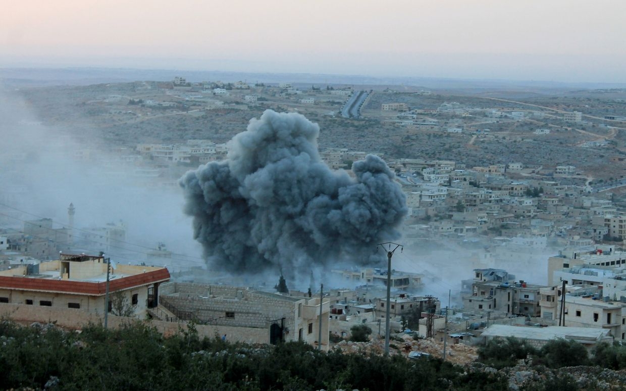 Smoke rises after Russian airstrikes hit Daret Ezza in Aleppo, Syria, on Oct. 13, 2015. Smoke rises after Russian airstrikes hit Daret Ezza in Aleppo, Syria, on Oct. 13, 2015. 