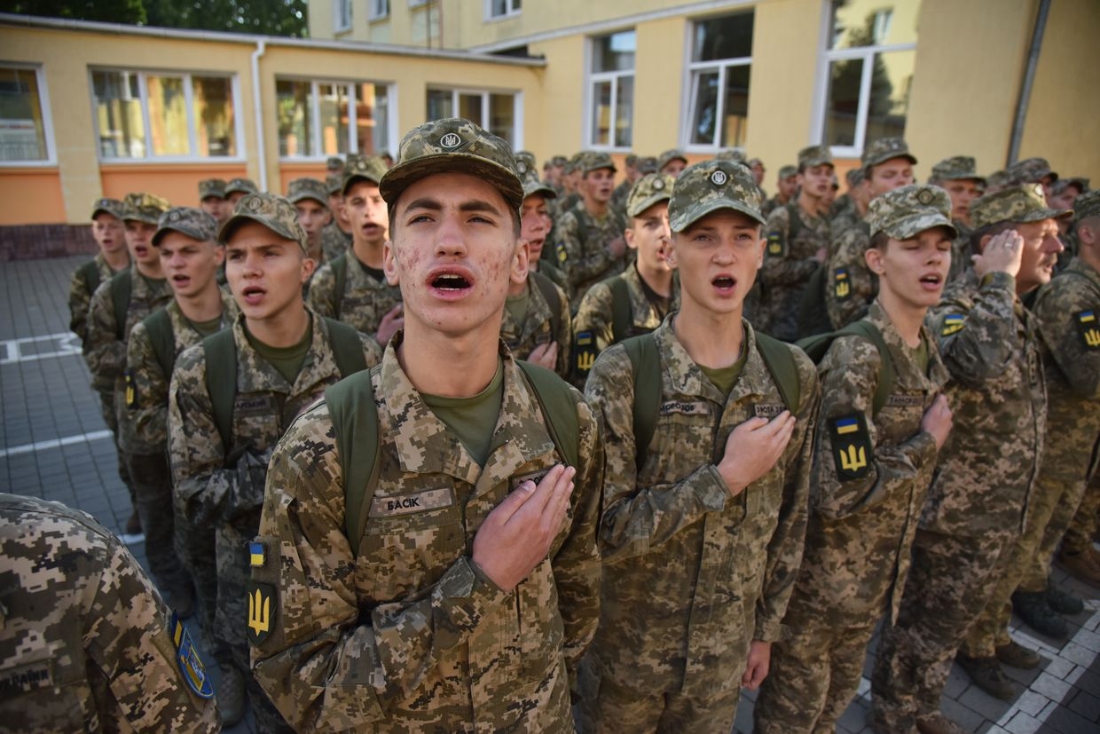 Cadets sing the national anthem of Ukraine during the celebration of the Day of Knowledge at the Lviv State Lyceum in Lviv, Ukraine, on Sept. 1, 2023. 