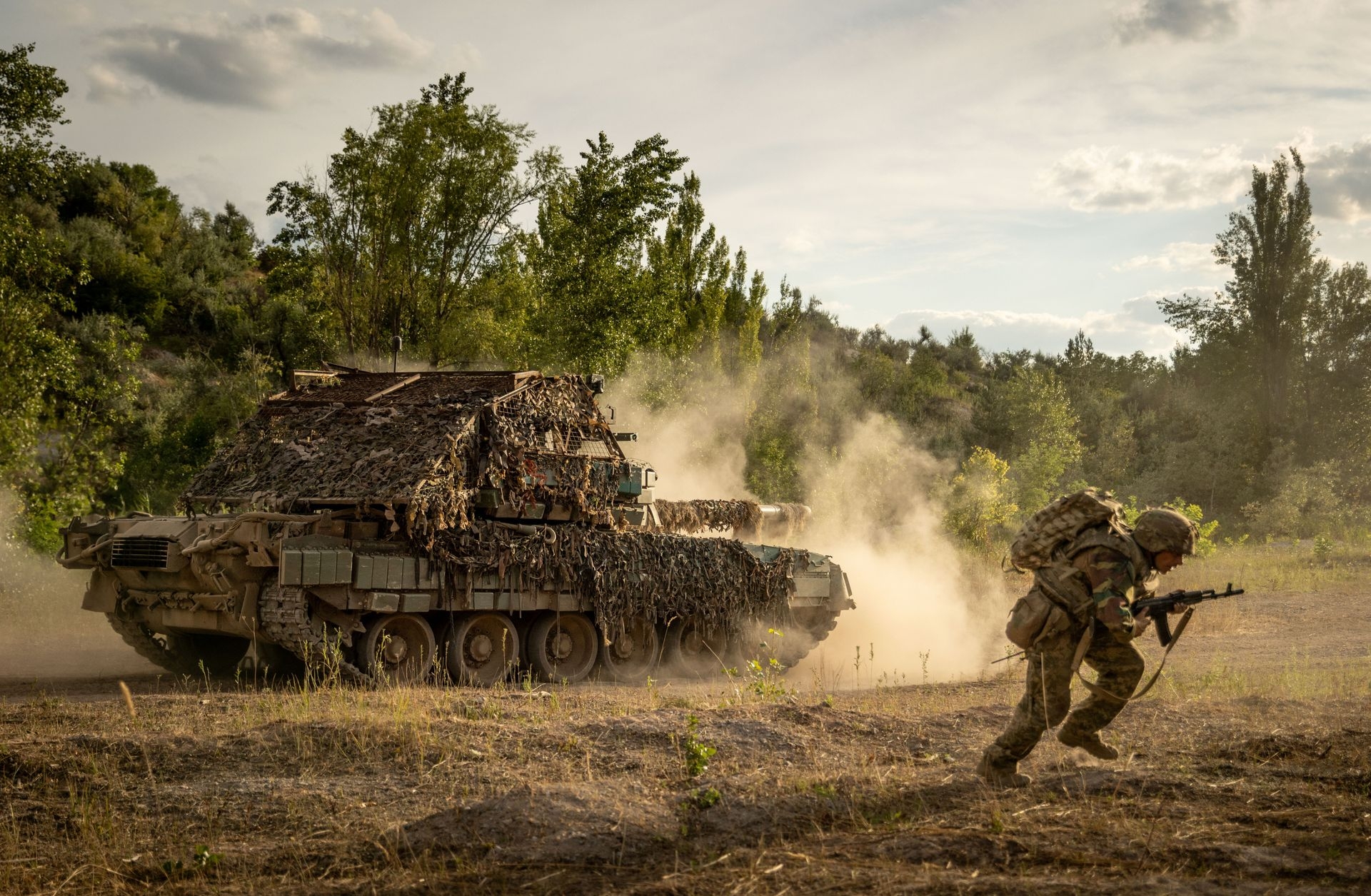 A T-80 tank from the 80th Air Assault Brigade fires during training near Chasiv Yar, Ukraine, on July 20, 2024.