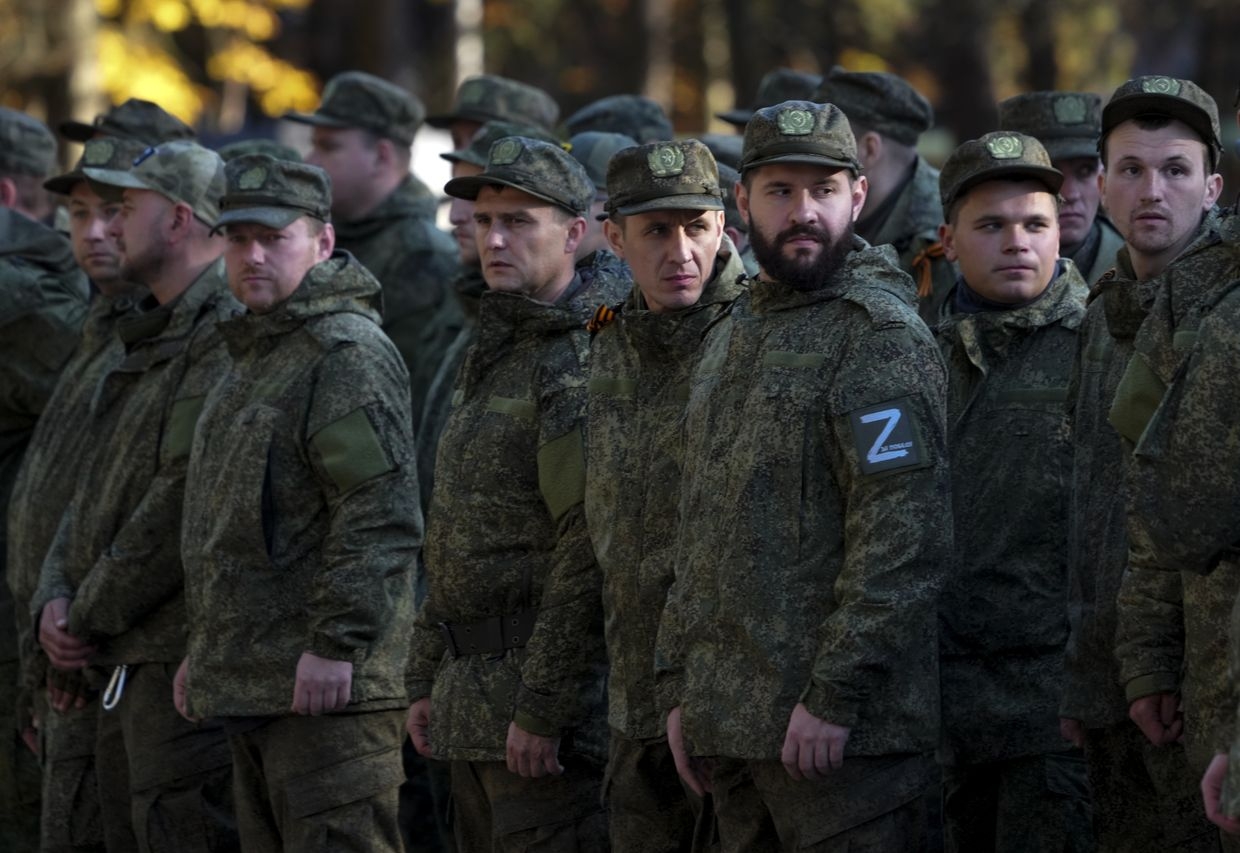 Russian citizens drafted during the partial mobilization are seen being dispatched to combat coordination areas after a military call-up for the Russian invasion of Ukraine in Moscow, Russia, on Oct. 10, 2022.