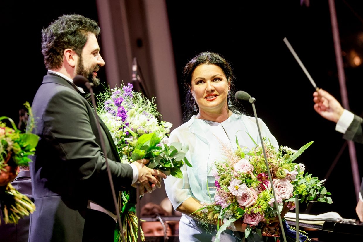 Pianist Malcolm Martineau and opera singer Anna Netrebko attend a recital and charity dinner during the Munich Opera Festival at the Nationaltheater in Munich, Germany, on July 17, 2019.Azerbaijani opera singer Yusif Eyvazov and Russian opera singer Anna Netrebko, perform on stage at the Thurn & Taxis Castle Festival in Regensburg, Germany, on July 23, 2022. 