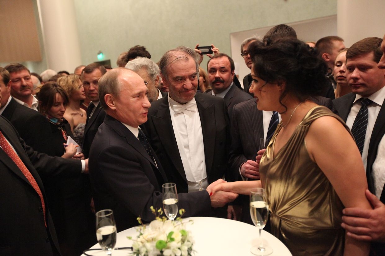 Russian President Vladimir Putin, conductor Valery Gergiev, and singer Anna Netrebko attend the opening of the new Mariinsky II Theatre in St. Petersburg, Russia, on May 2, 2013. 