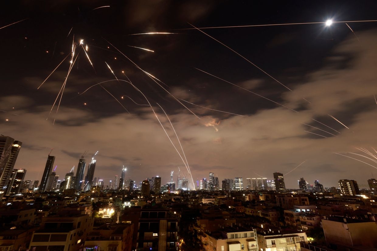 Israeli air defense systems intercept Iranian missiles over Tel Aviv during a fresh barrage on June 16, 2025. 