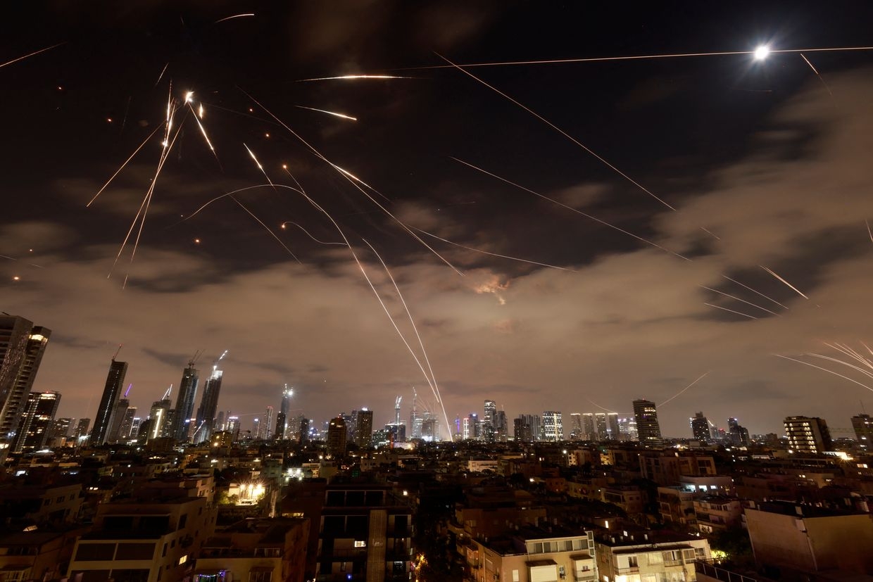 Israeli air defense systems intercept Iranian missiles over Tel Aviv during a fresh barrage on June 16, 2025. 
