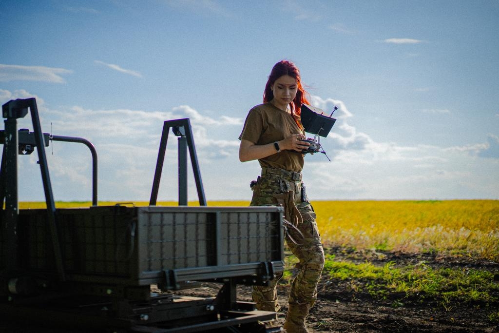 Jess, an operator of Khartiia’s Unmanned Ground Vehicle, prepares for a mission in unspecified location, Ukraine on an unspecified date. 