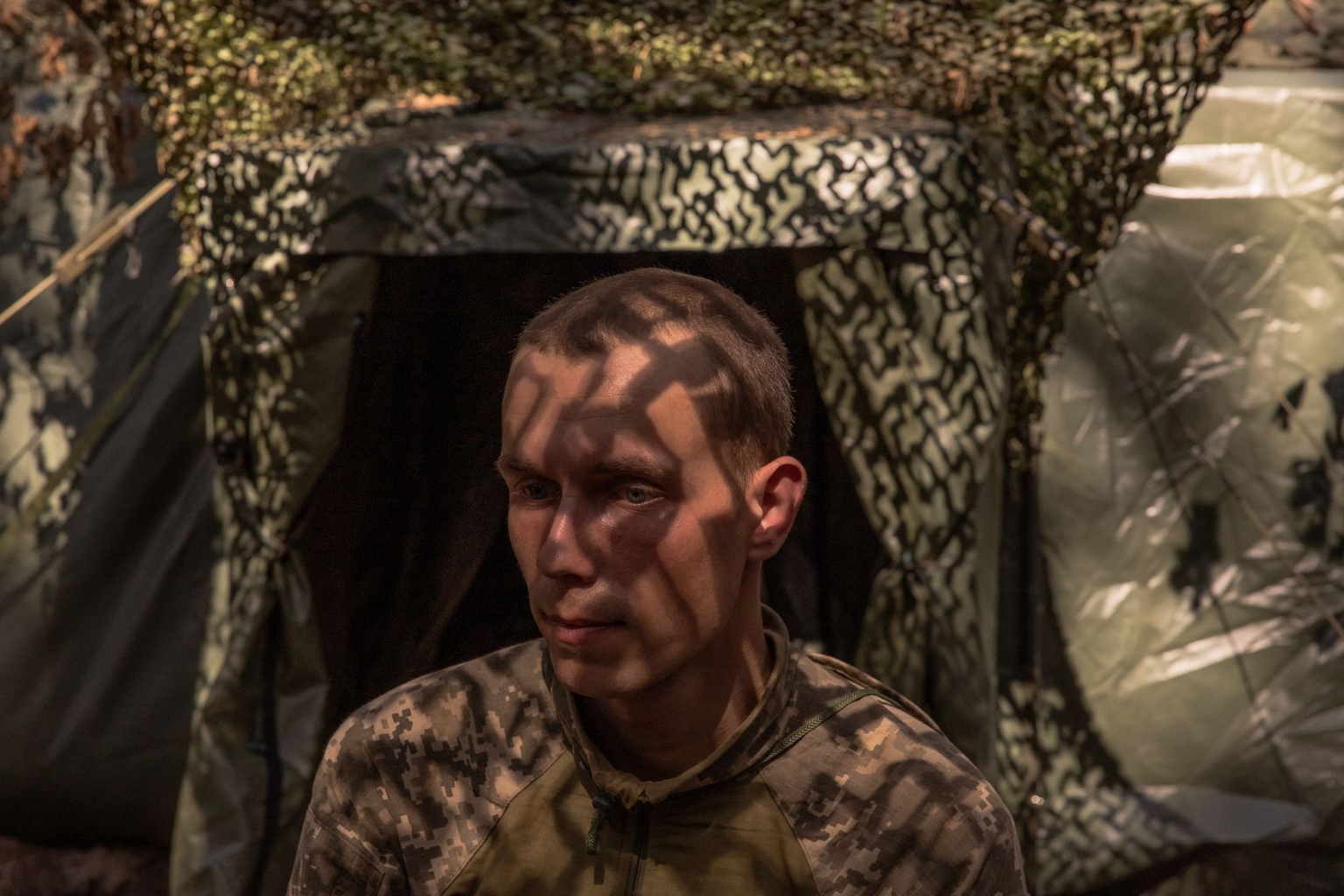 A soldier of the 92nd Assault Brigade of Ukraine’s army, poses for a photo in an undisclosed area in Kharkiv Oblast, Ukraine, on June 28, 2024, amid the Russian invasion of Ukraine. 