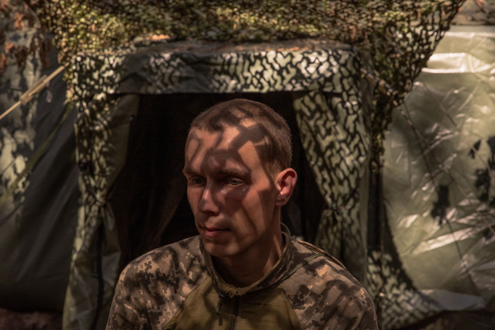 A soldier of the 92nd Assault Brigade of Ukraine’s army, poses for a photo in an undisclosed area in Kharkiv Oblast, Ukraine, on June 28, 2024, amid the Russian invasion of Ukraine. 