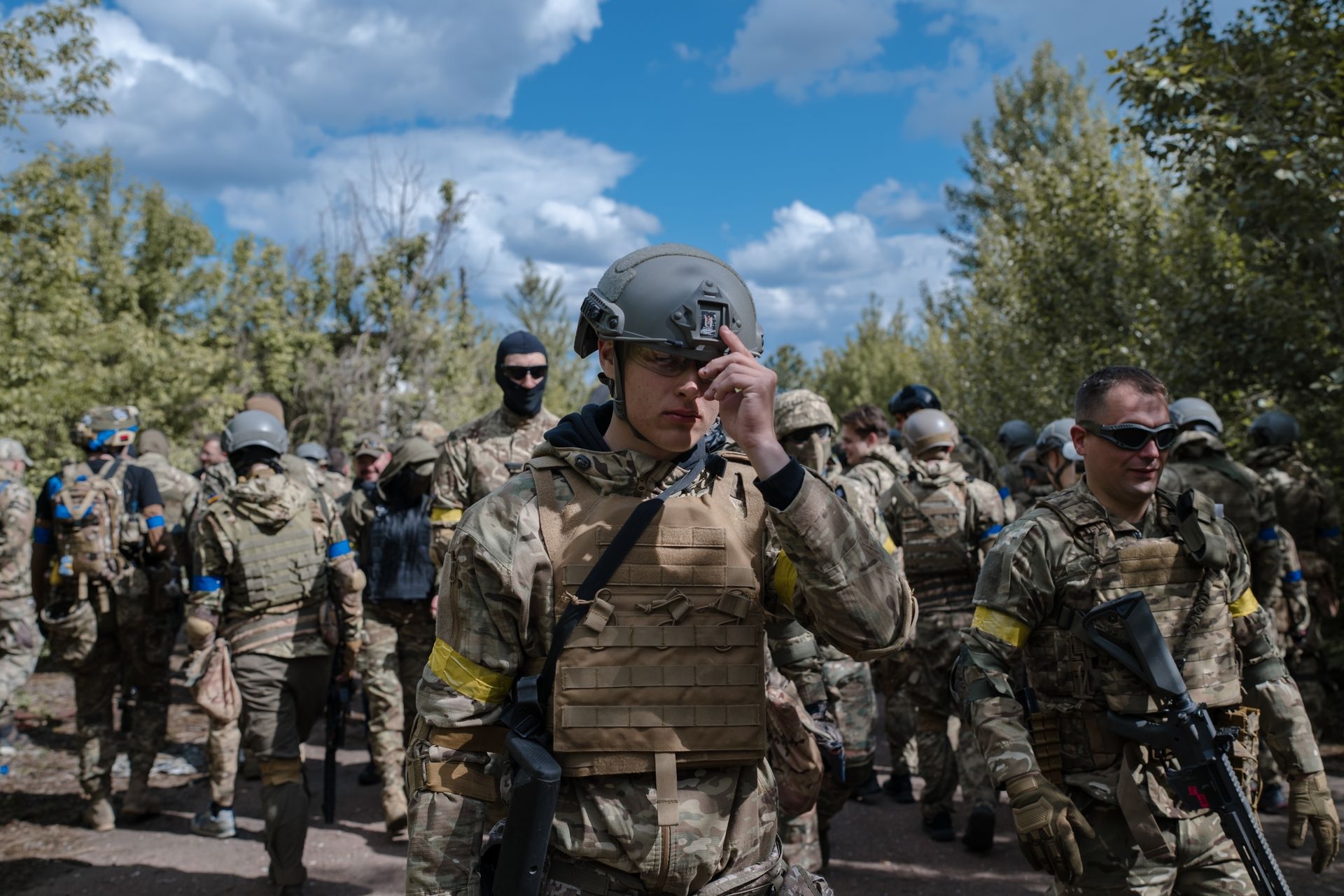 Civilians and veterans of the Russian-Ukrainian war participate in a training game in Kyiv, Ukraine, on May 10, 2025. 