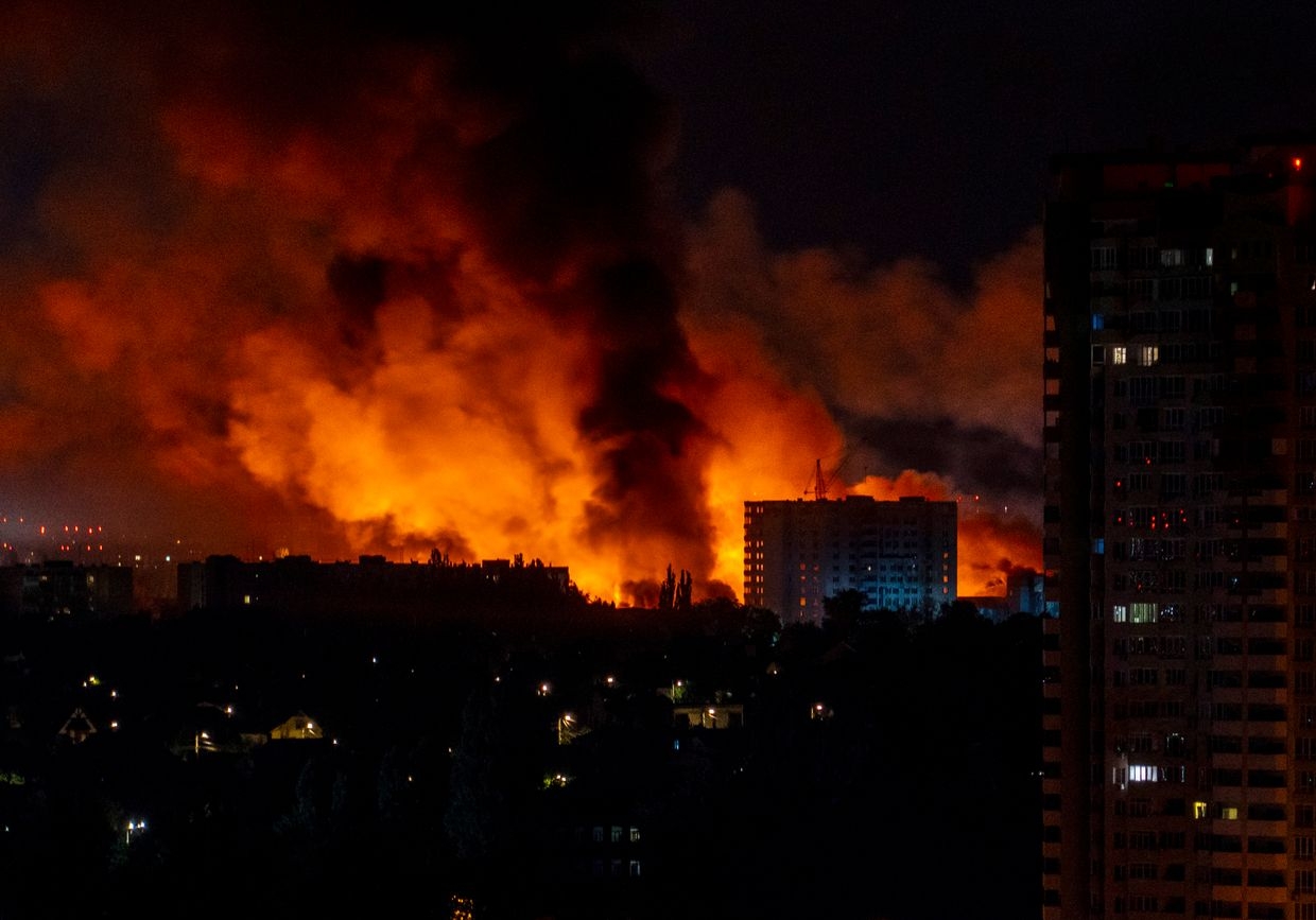 Flames and smoke billow from buildings in Kyiv, Ukraine, on July 4, 2025, during mass Russian drone and missile strikes. 