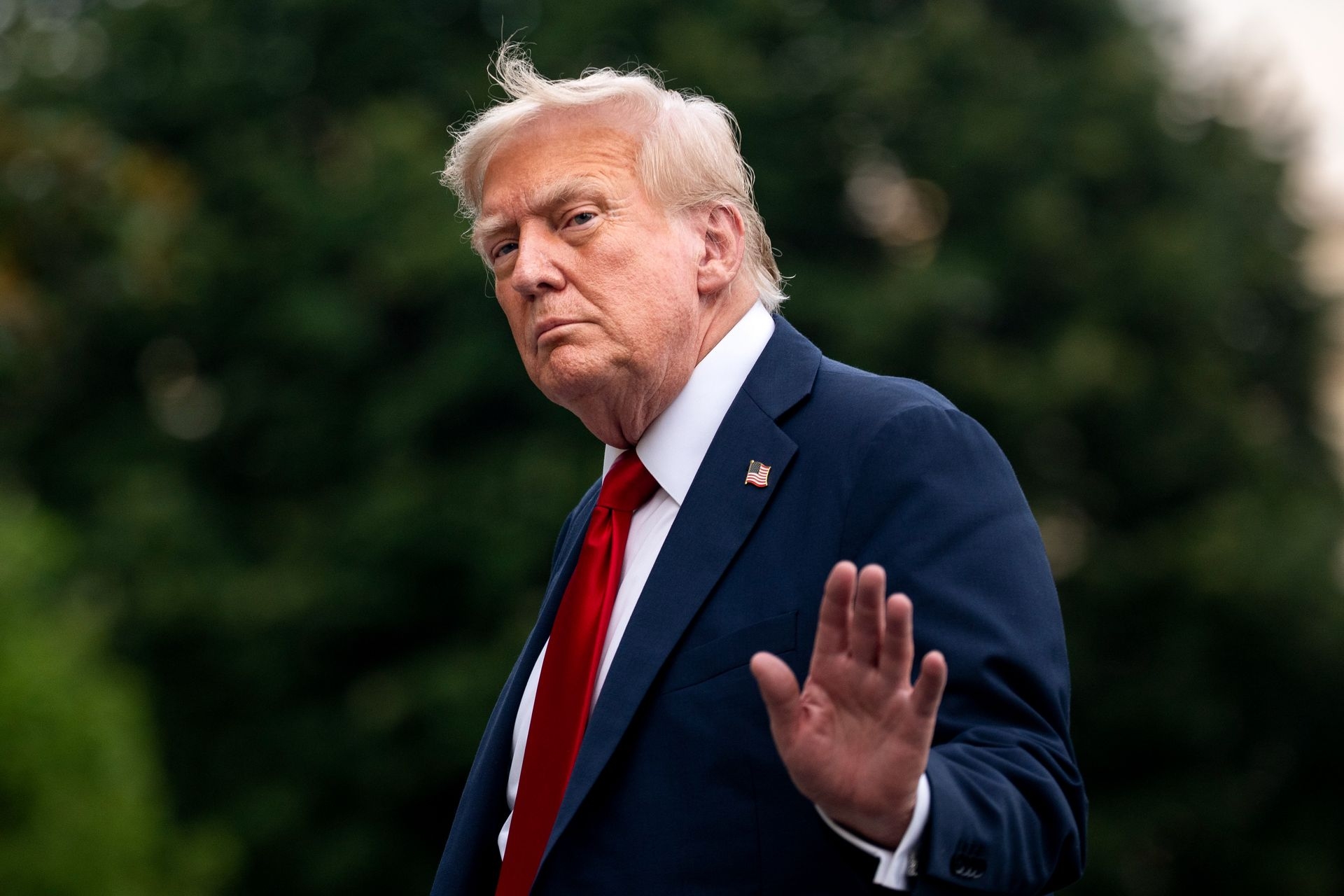 U.S. President Donald Trump walks on the South Lawn of the White House after arriving on Marine One in Washington, DC, U.S., on  July 13, 2025. 
