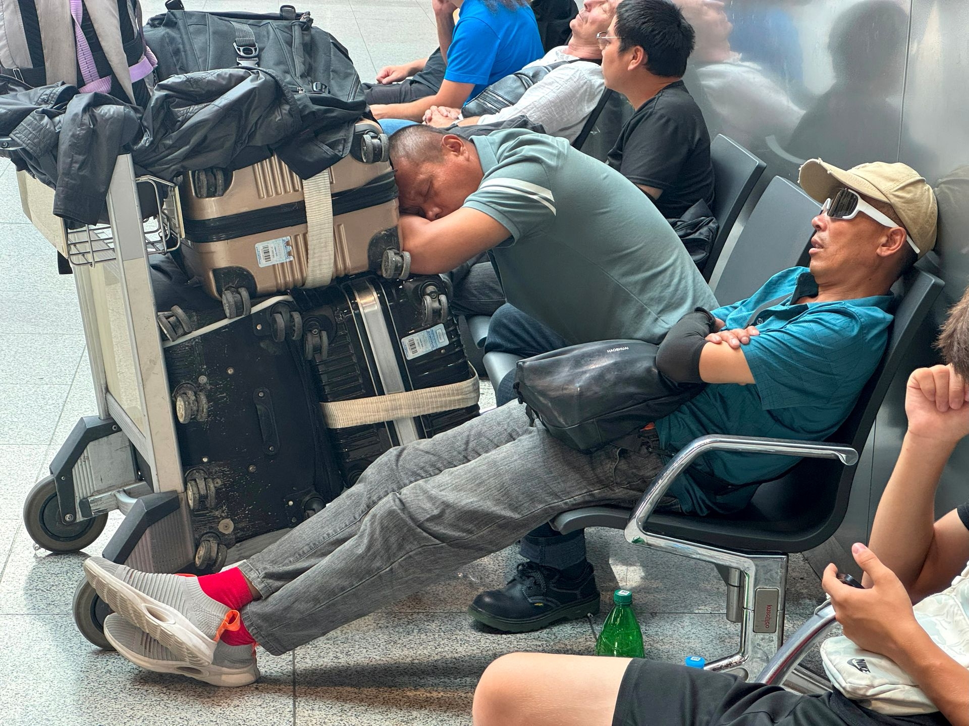 Travelers wait at Sheremetyevo International Airport on the outskirts of Moscow, Russia, on July 28, 2025.