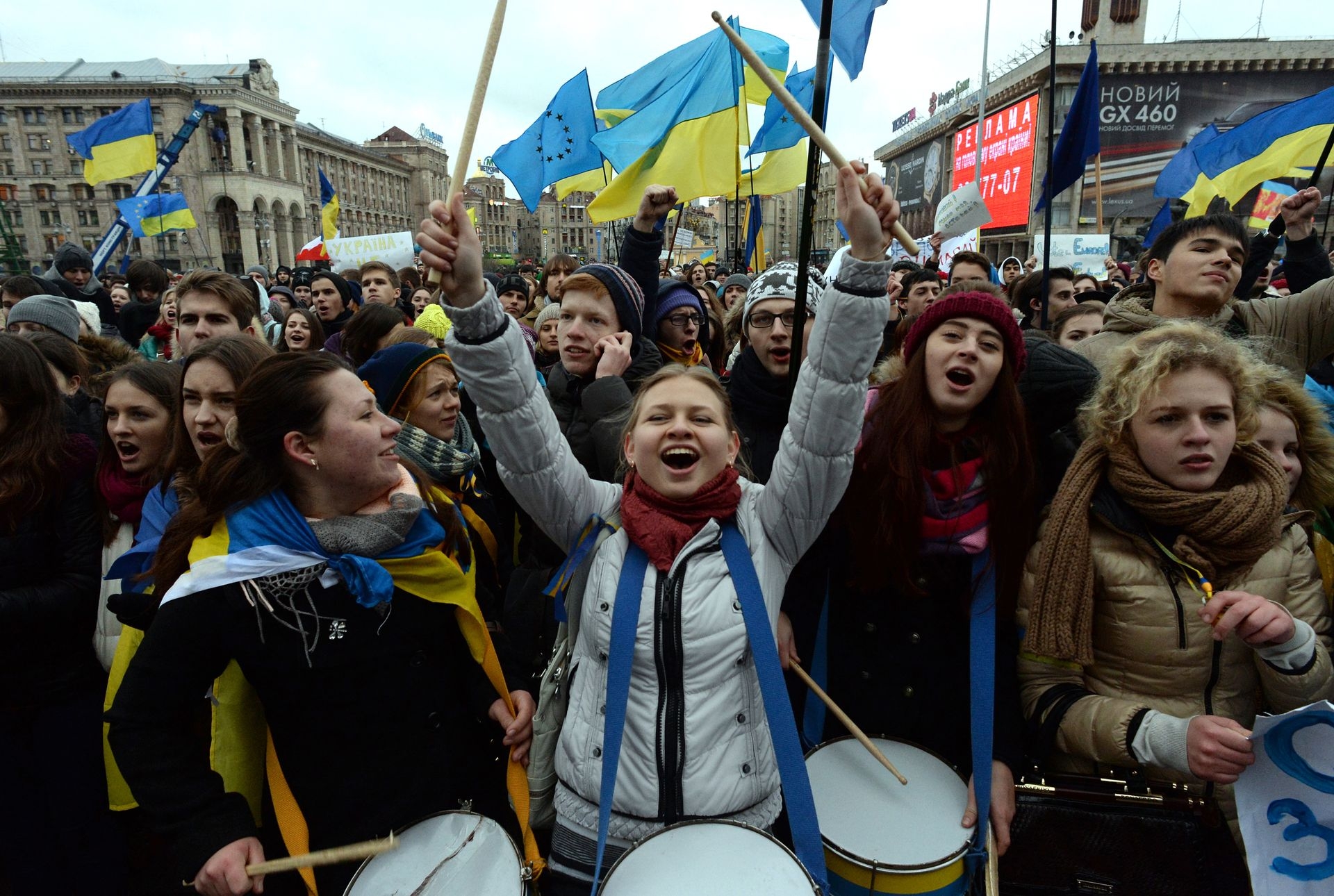 Students hold placards and flags during a pro-European rally in Lviv, Ukraine, on Nov. 27, 2013.