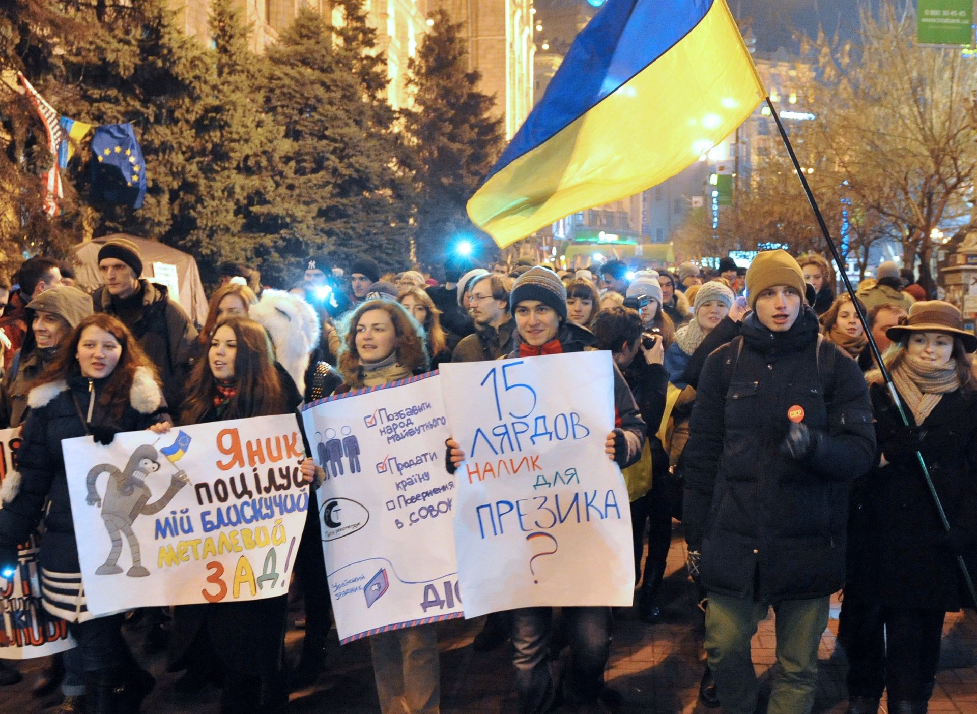 Students hold placards during a rally in Independence Square in Kyiv, Ukraine, on Dec. 19, 2013.