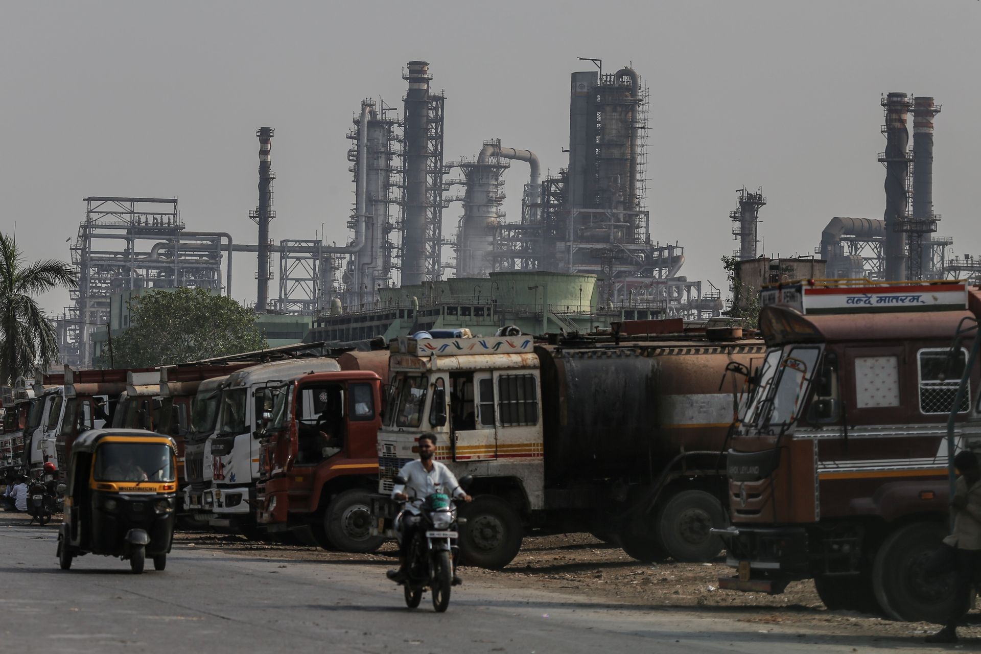 Oil tanker trucks are seen outside an oil refinery operated by Bharat Petroleum Corp. Ltd. in Mumbai, India, on April 4, 2025.