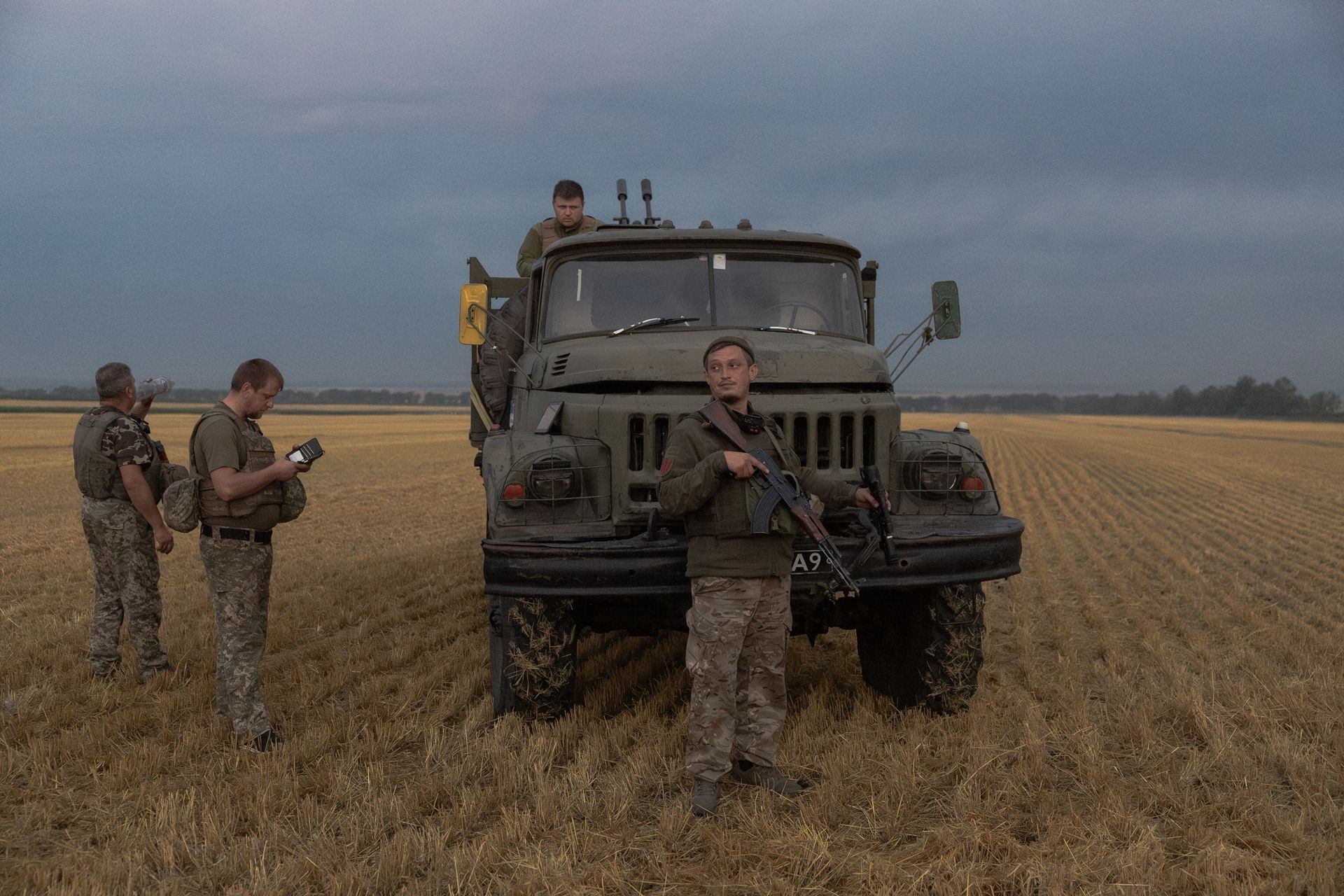 A Ukrainian serviceman of the 59th Brigade mobile air defence unit stands next to a military truck during a Russian air attack near Pavlohrad, Dnipropetrovsk Oblast, Ukraine, on July 19, 2025. 
