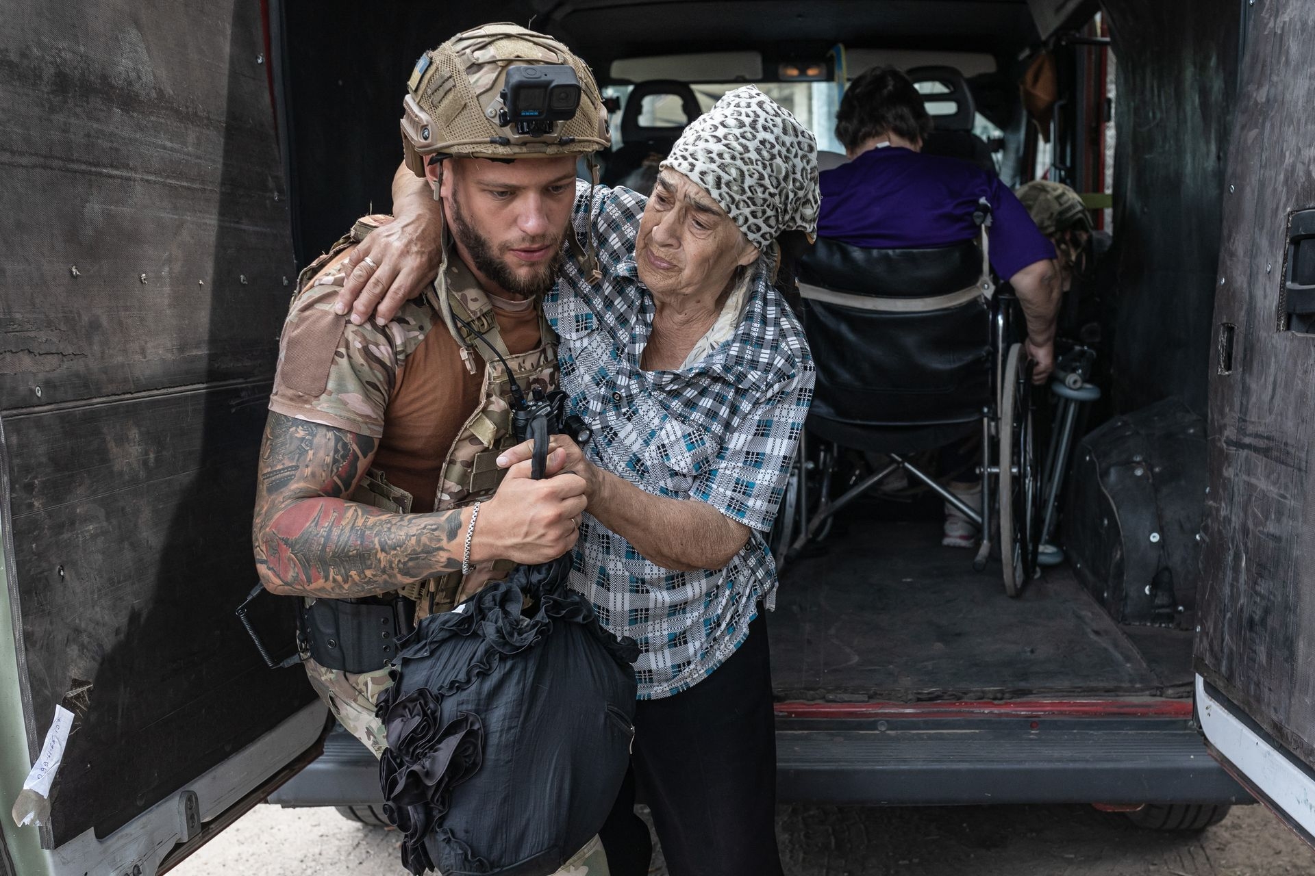 Volunteers and Ukrainian forces evacuate civilians from Kostiantynivka, Ukraine, on Aug. 7, 2025.
