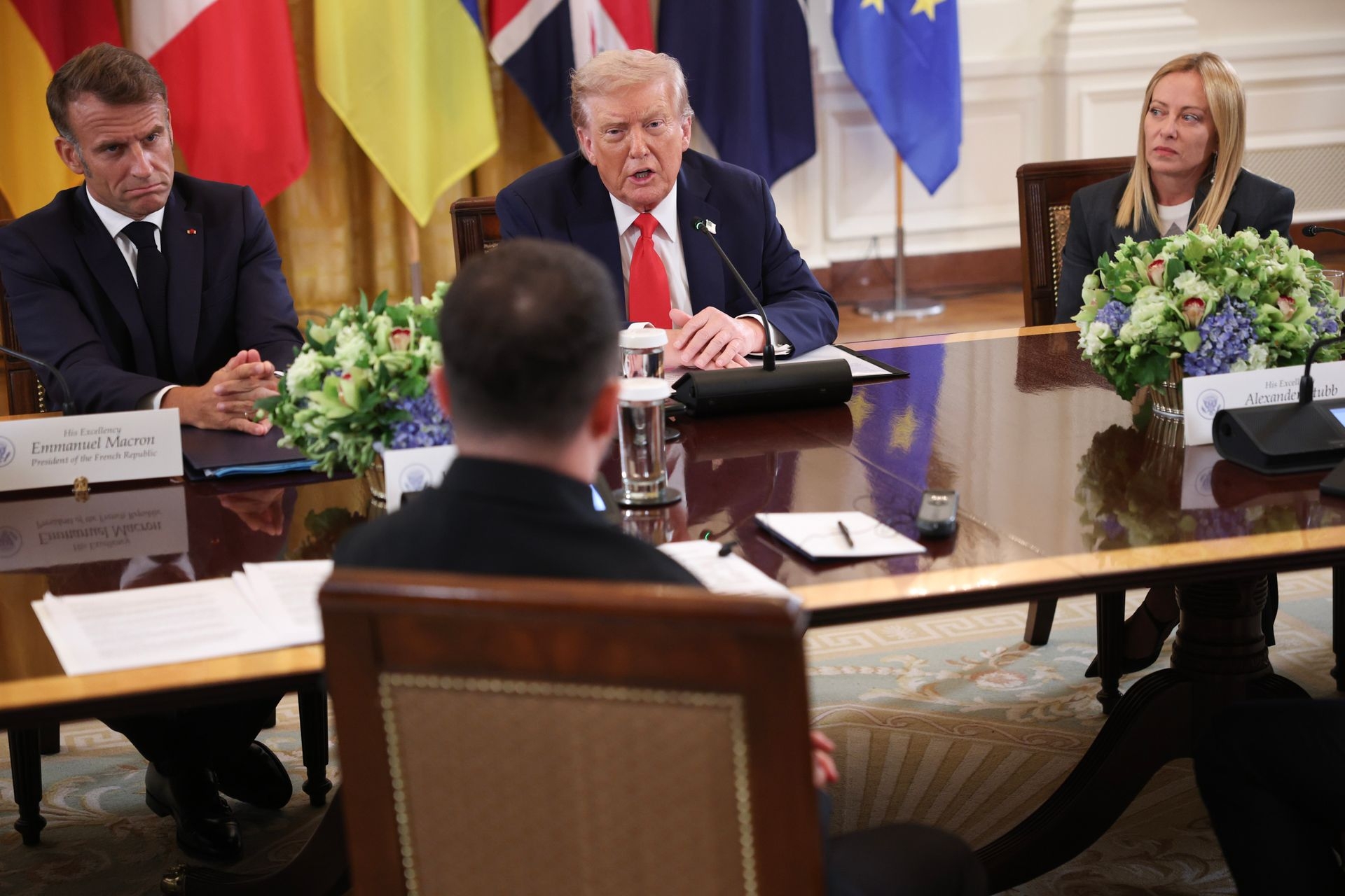 U.S. President Donald Trump (C) hosts a meeting with President Volodymyr Zelensky and European leaders, including French President Emmanuel Macron (L) and Italian Prime Minister Giorgia Meloni in Washington, D.C., U.S. on Aug. 18, 2025. 