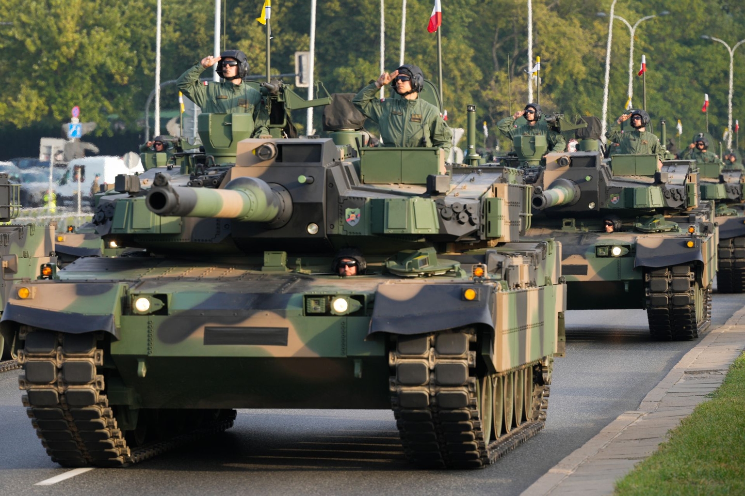 K2 tanks take part in early morning rehearsals for the upcoming annual military parade in Warsaw, Poland, on Aug. 10, 2025. 