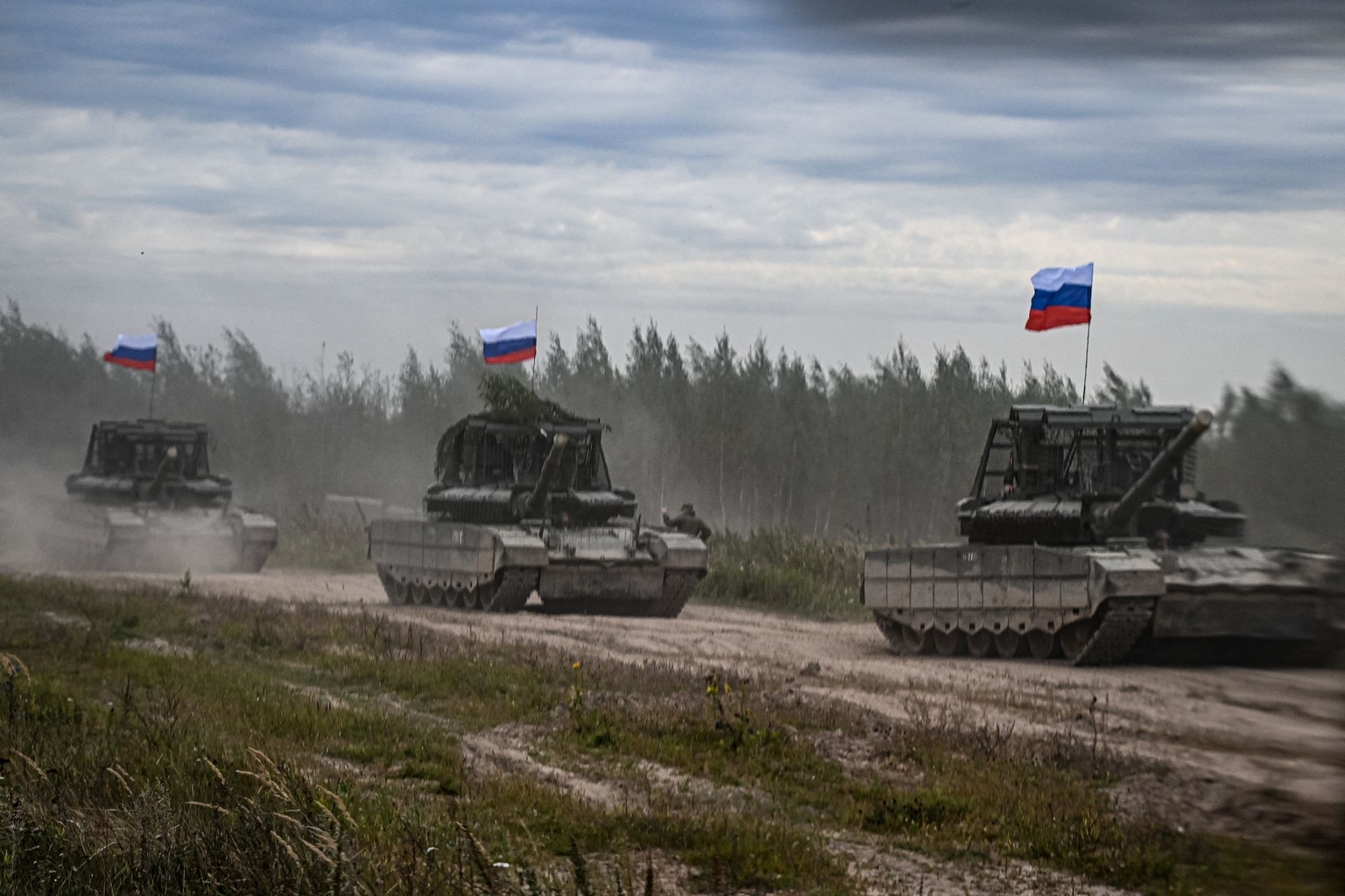 Russian tanks move during the “Zapad-2025” (West-2025) joint Russian-Belarusian military drills at a training ground near the town of Barysaw, east of Minsk, Belarus, on Sept. 15, 2025. 
