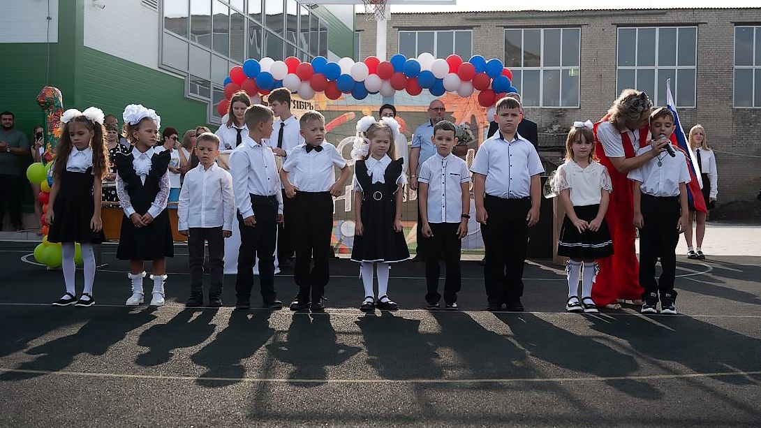 Young students attend the first day of school at School No. 2 in Russian-occupied Henichesk, Kherson Oblast, Ukraine, on Sept. 1, 2025.