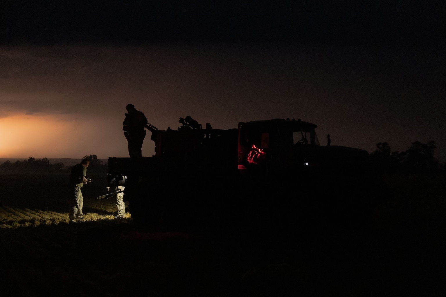 Ukrainian servicemen scan the sky near Pavlohrad, Dnipropetrovsk Oblast, Ukraine, on July 19, 2025.