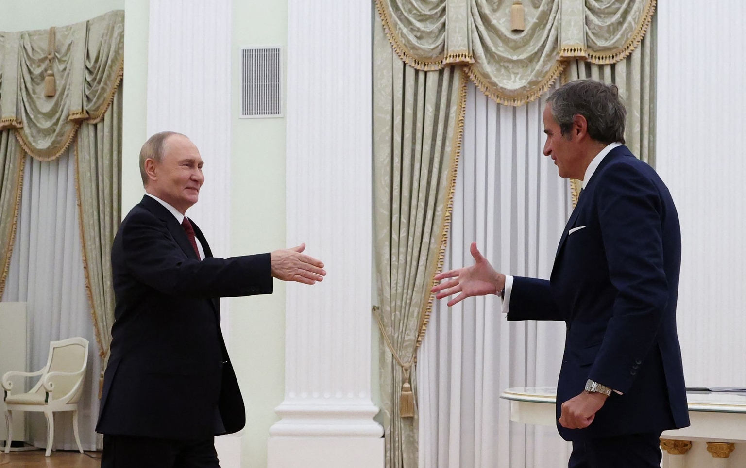 Russia’s President Vladimir Putin (L) and Director General of the International Atomic Energy Agency Rafael Grossi (R) attend a meeting at the Kremlin in Moscow, Russia on Sept. 25, 2025.