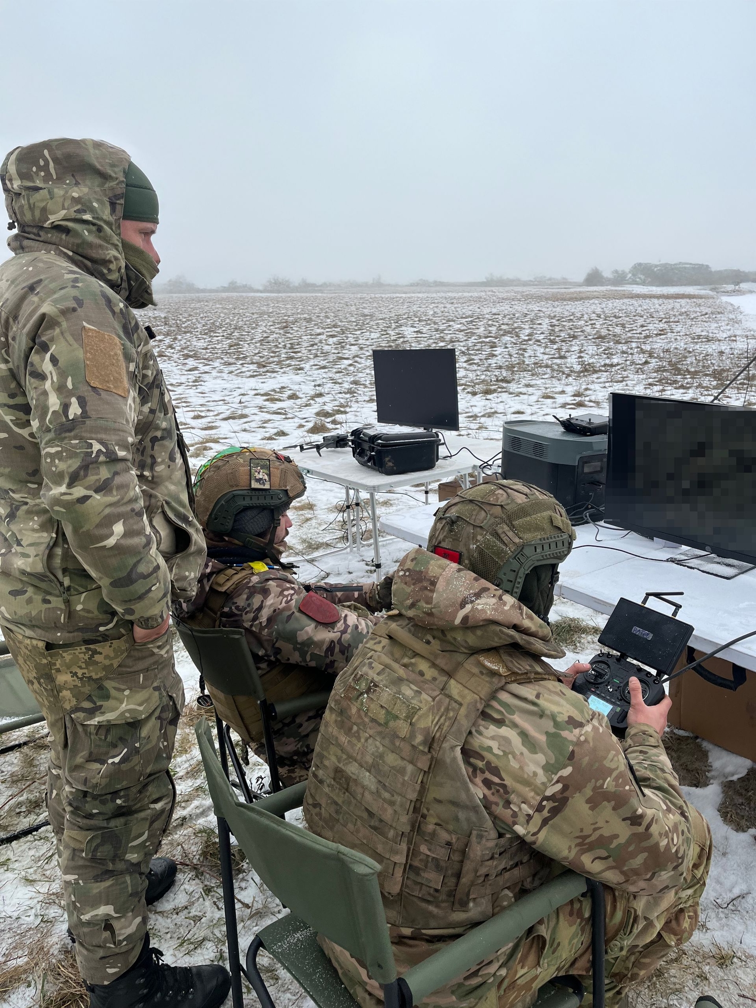 Ukrainian soldiers practice operating unmanned ground vehicles as part of the Dignitas’ Victory Robots program. (Courtesy of Dignitas)