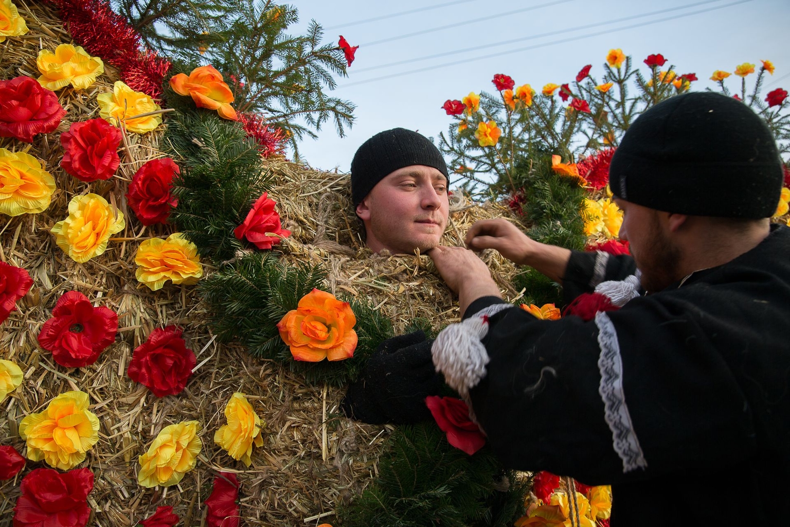 People prepare their costumes ahead of Malanka celebrations in Krasnoilsk, Chernivtsi Oblast, Ukraine, on Jan. 13, 2022. 