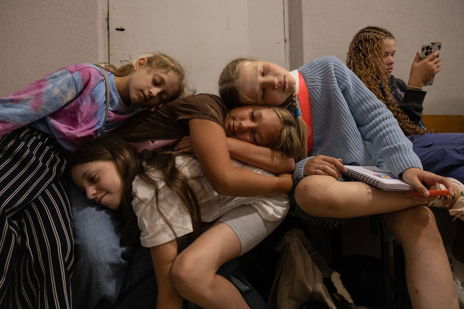 Students rest in a shelter at the Kyiv State Music Lyceum M.V. Lysenka on the second day of classes during an air alert that lasted more than three hours.