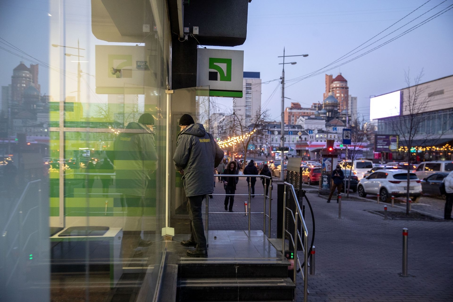 A customer enters a PrivatBank CSJC branch in Kyiv, Ukraine, on Feb. 15, 2022.