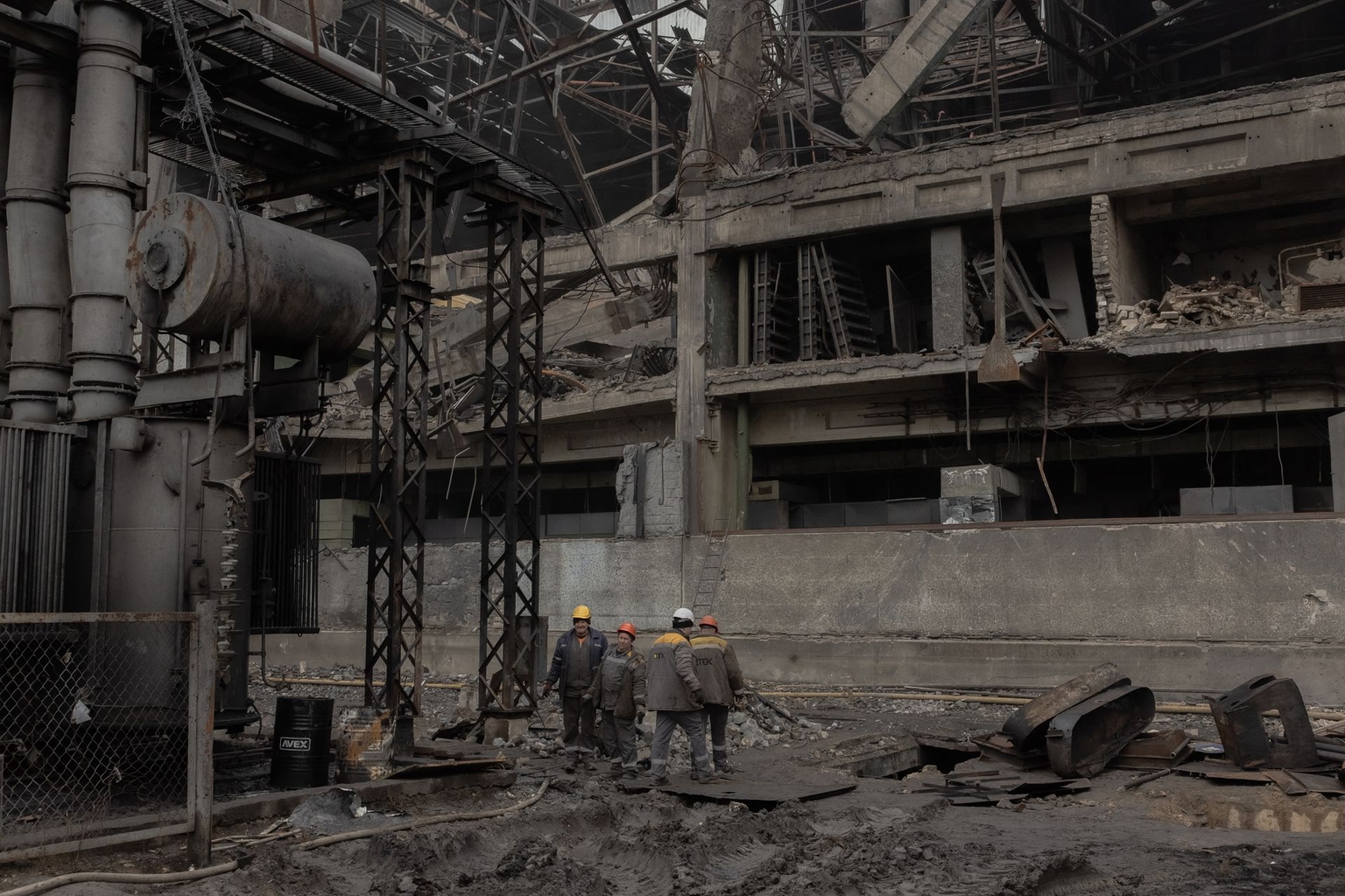 Employees work at a power plant operated by Ukrainian energy provider DTEK at an undisclosed location in Ukraine, on Nov. 13, 2025, after the facility was damaged by repeated air attacks. 