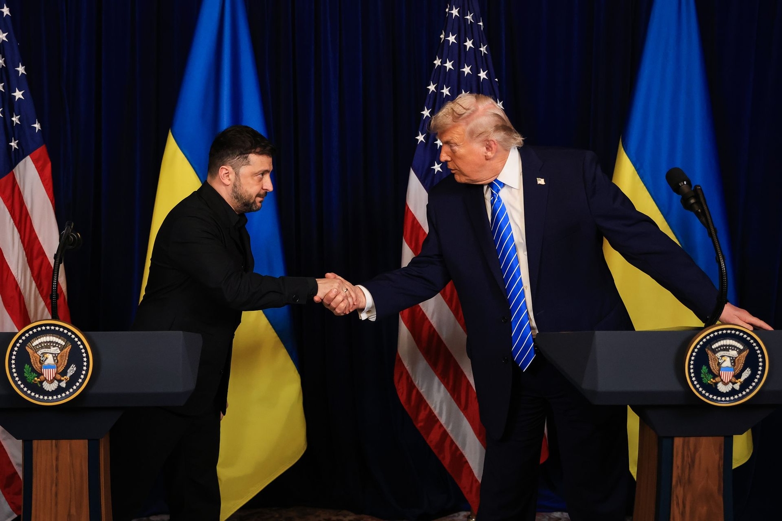 President Volodymyr Zelensky and U.S. President Donald Trump shake hands at Trump’s Mar-a-Lago club in Palm Beach, Florida, U.S. on Dec. 28, 2025. 