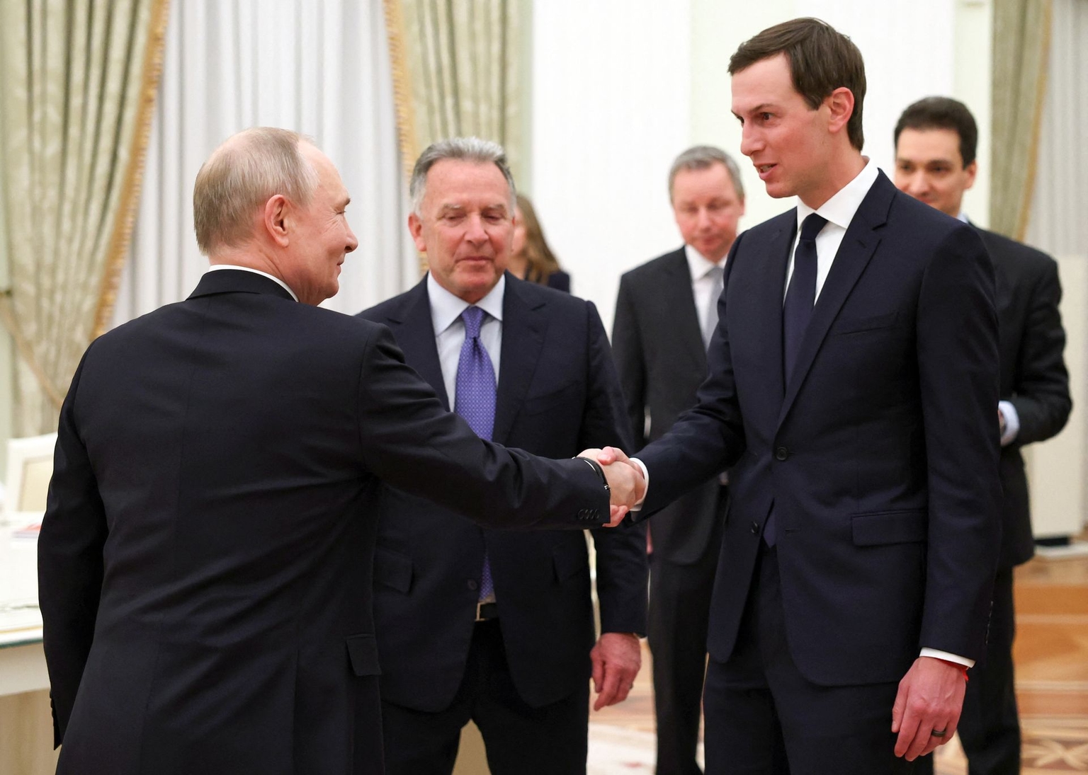  Vladimir Putin (L) welcomes U.S. special envoy Steve Witkoff (C) and U.S. President Donald Trump’s son-in-law Jared Kushner (R) during a meeting at the Kremlin in Moscow on Jan. 22, 2026.