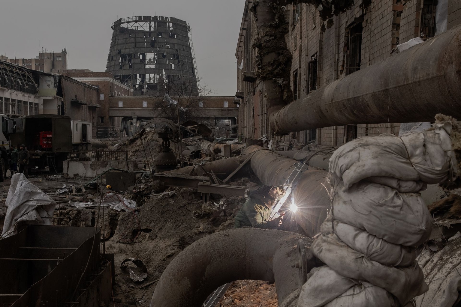 Employees repair sections of the combined heat and power plant damaged by Russian air strikes in Kyiv, Ukraine, on Feb. 4, 2026.