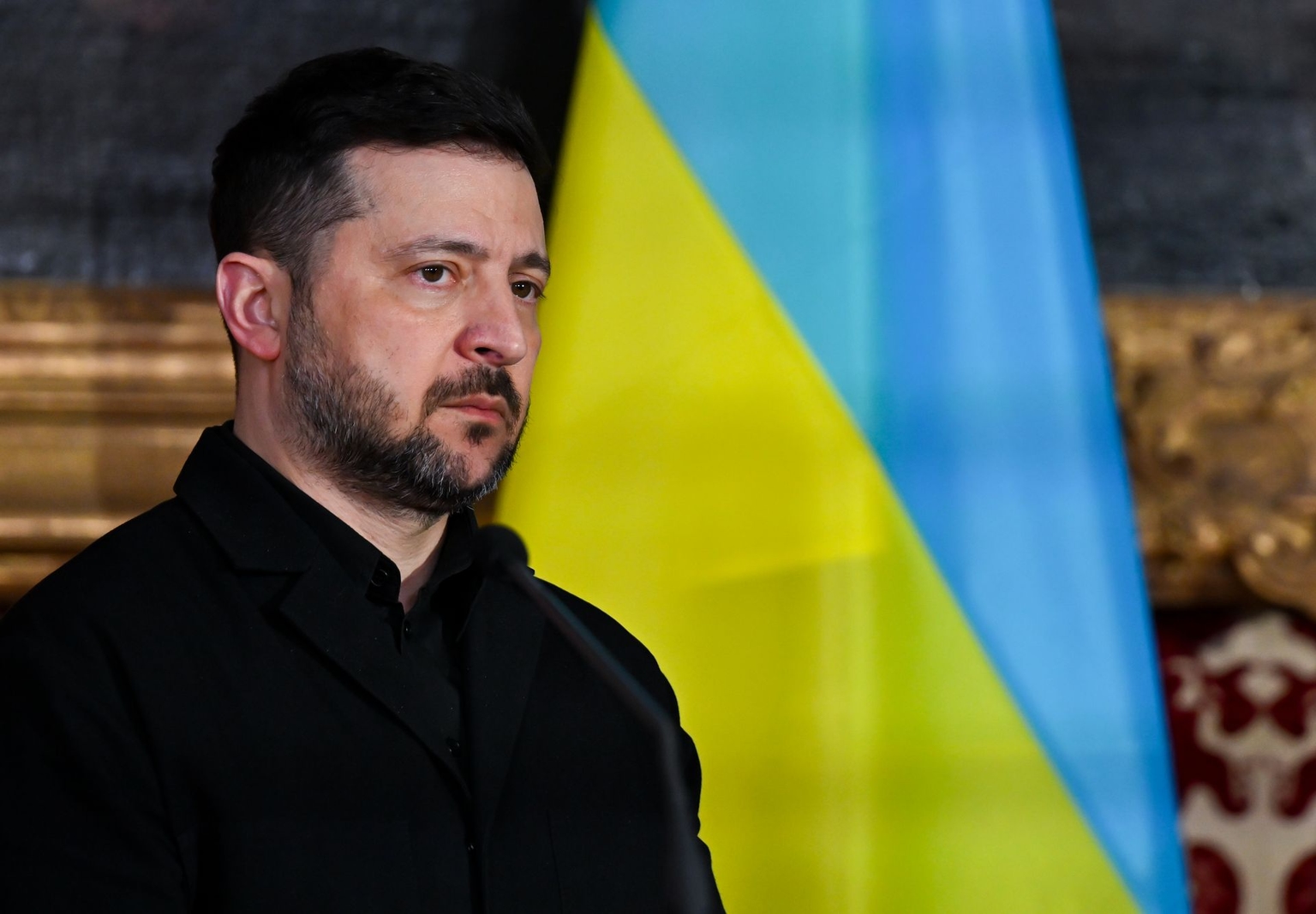 President Volodymyr Zelensky stands before receiving the Ewald von Kleist Prize in Munich, Germany, on Feb. 14, 2026. 