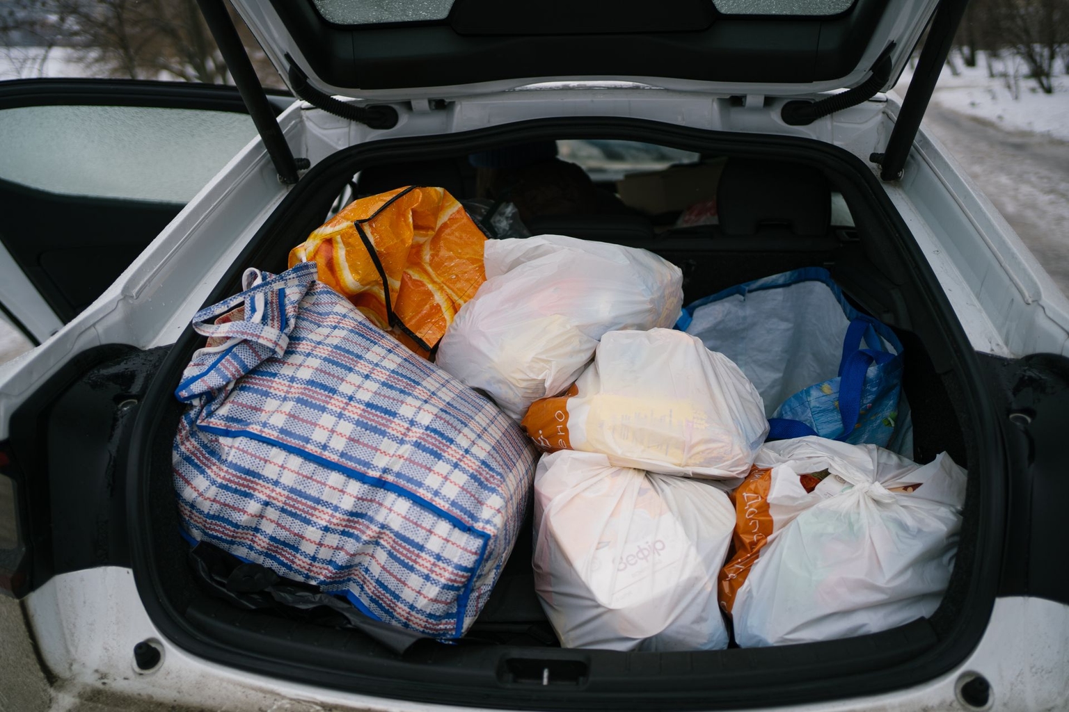 Care packages from the Starenki foundation are seen in the trunk of the car in Kyiv, Ukraine, on Jan. 27, 2026. 