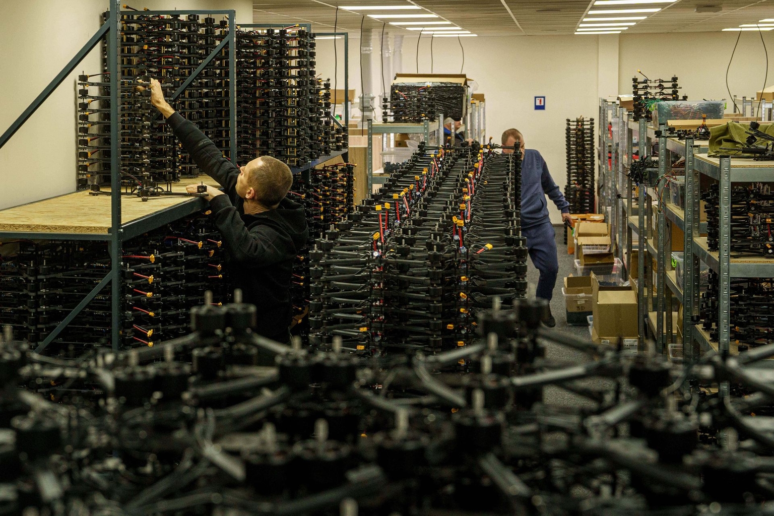 An engineer collects FPV drones of the "General Cherry" company at the workshop in an undisclosed location in Ukraine, on Dec. 4, 2025.
