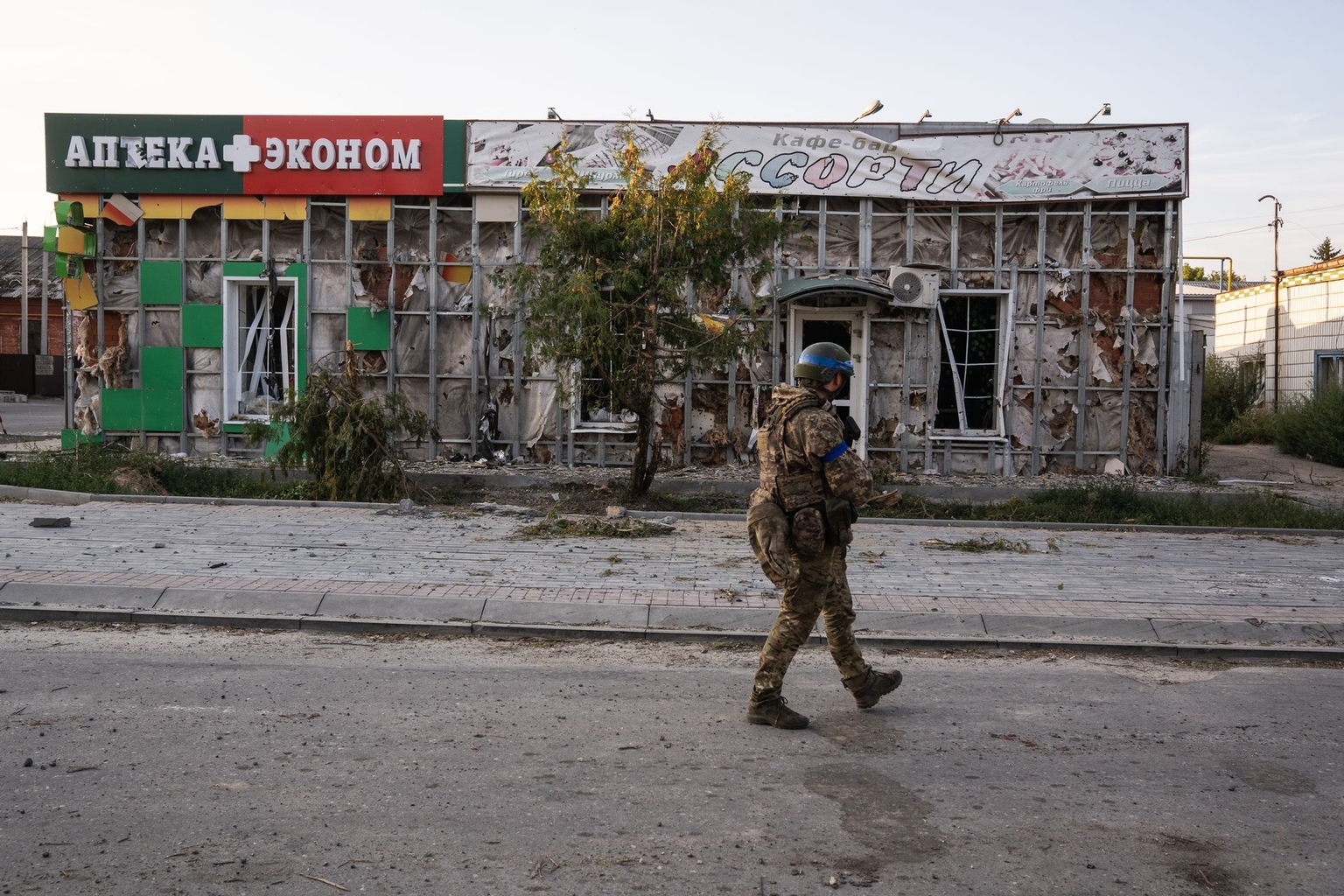 A Ukrainian soldier walks along an empty street in Sudzha, Russia, on Aug. 16, 2024. 