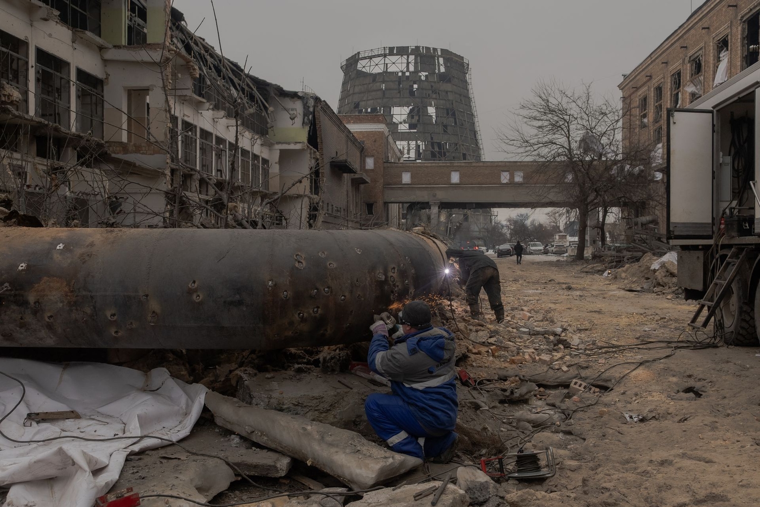 Employees repair sections of the Darnytska combined heat and power plant damaged by Russian air strikes in Kyiv, Ukraine, on Feb. 4, 2026, amid the Russian invasion. 