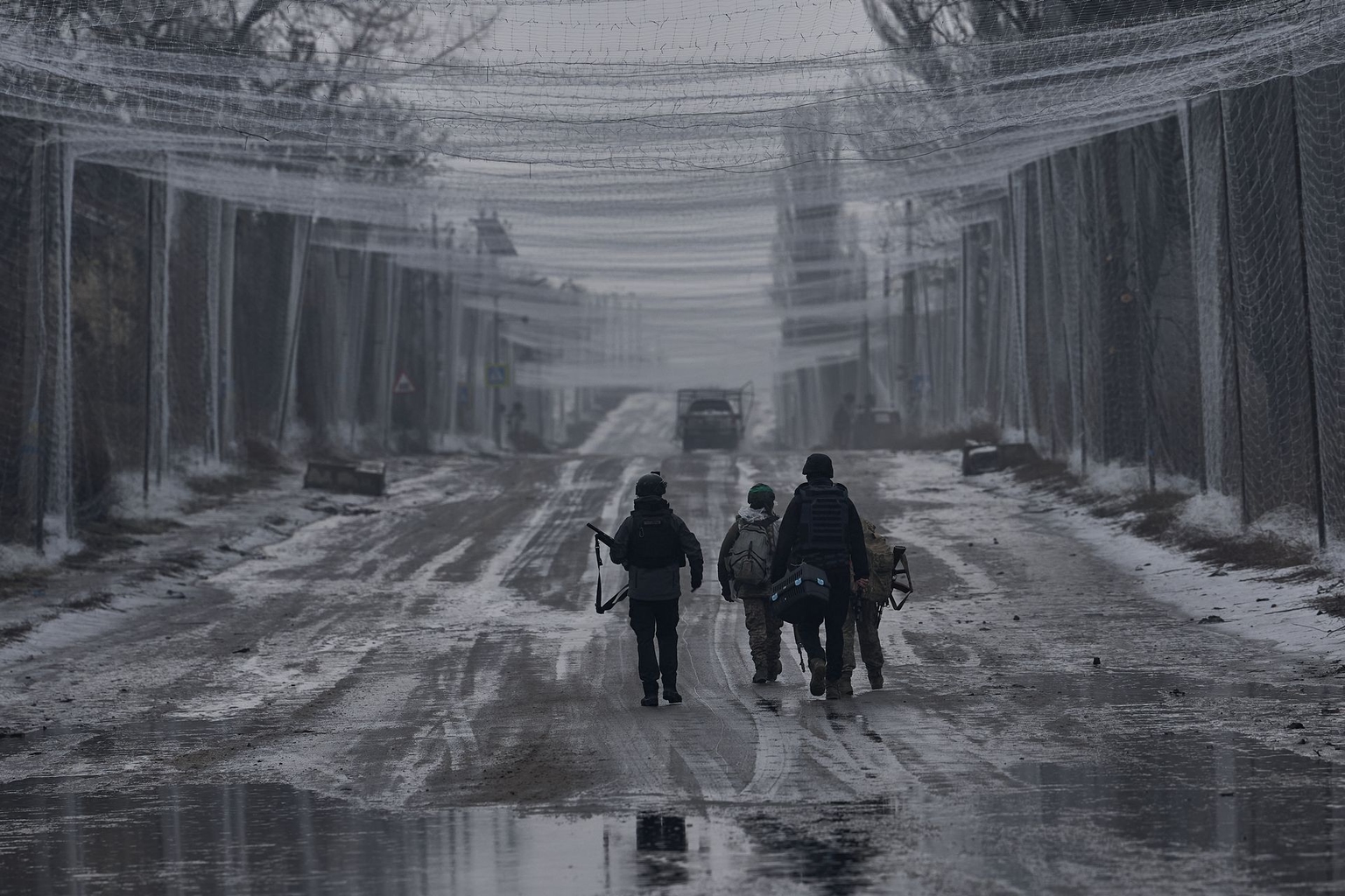 Protective nets are installed above a road between Druzhkivka and Kostyantynivka to intercept Russian FPV drones in Donetsk Oblast, Ukraine, on Feb. 13, 2026. 