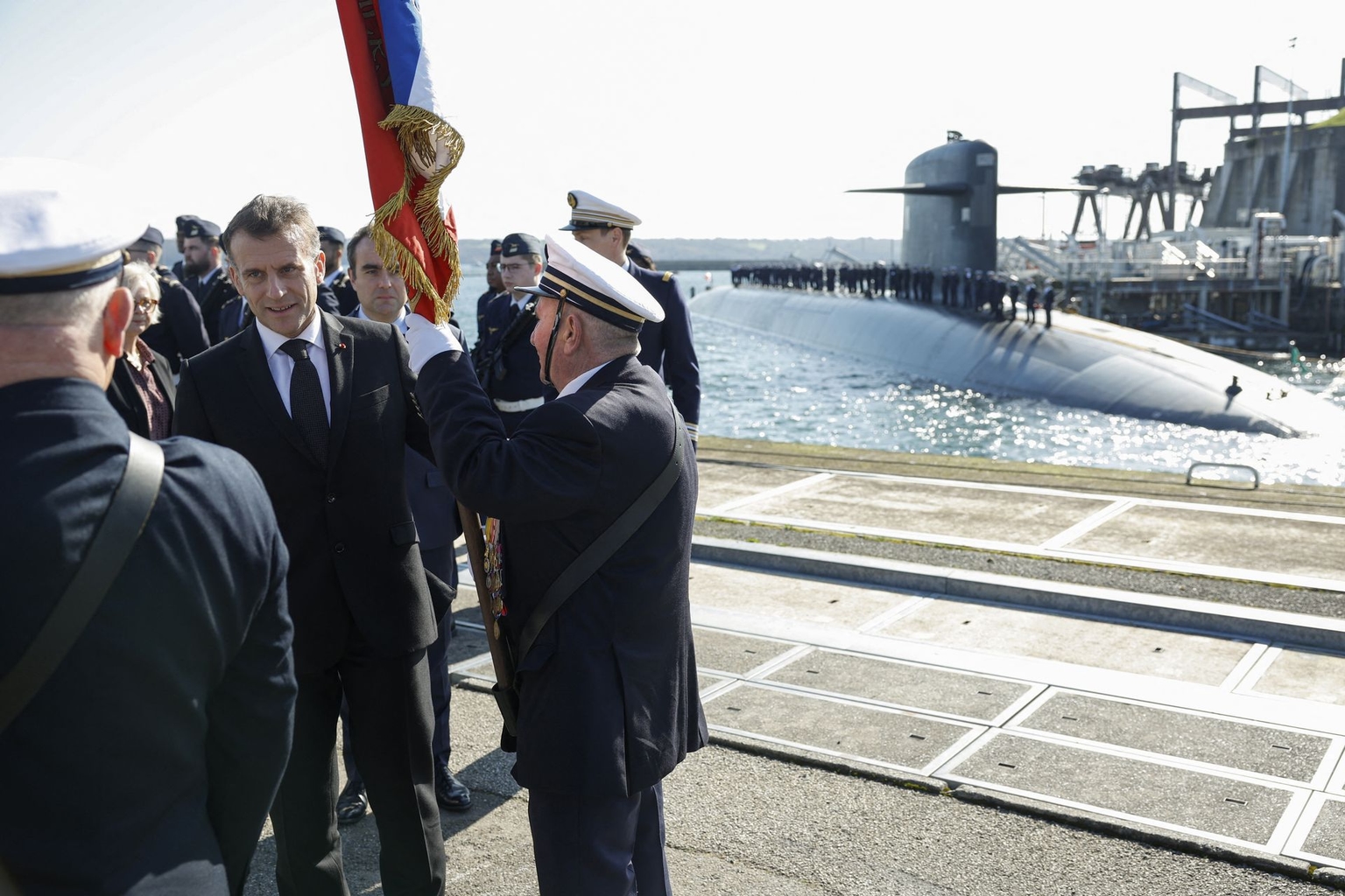 France’s President Emmanuel Macron greets members of the French Navy upon arriving at the Île Longue nuclear submarine base in Crozon, France, on March 2, 2026.
