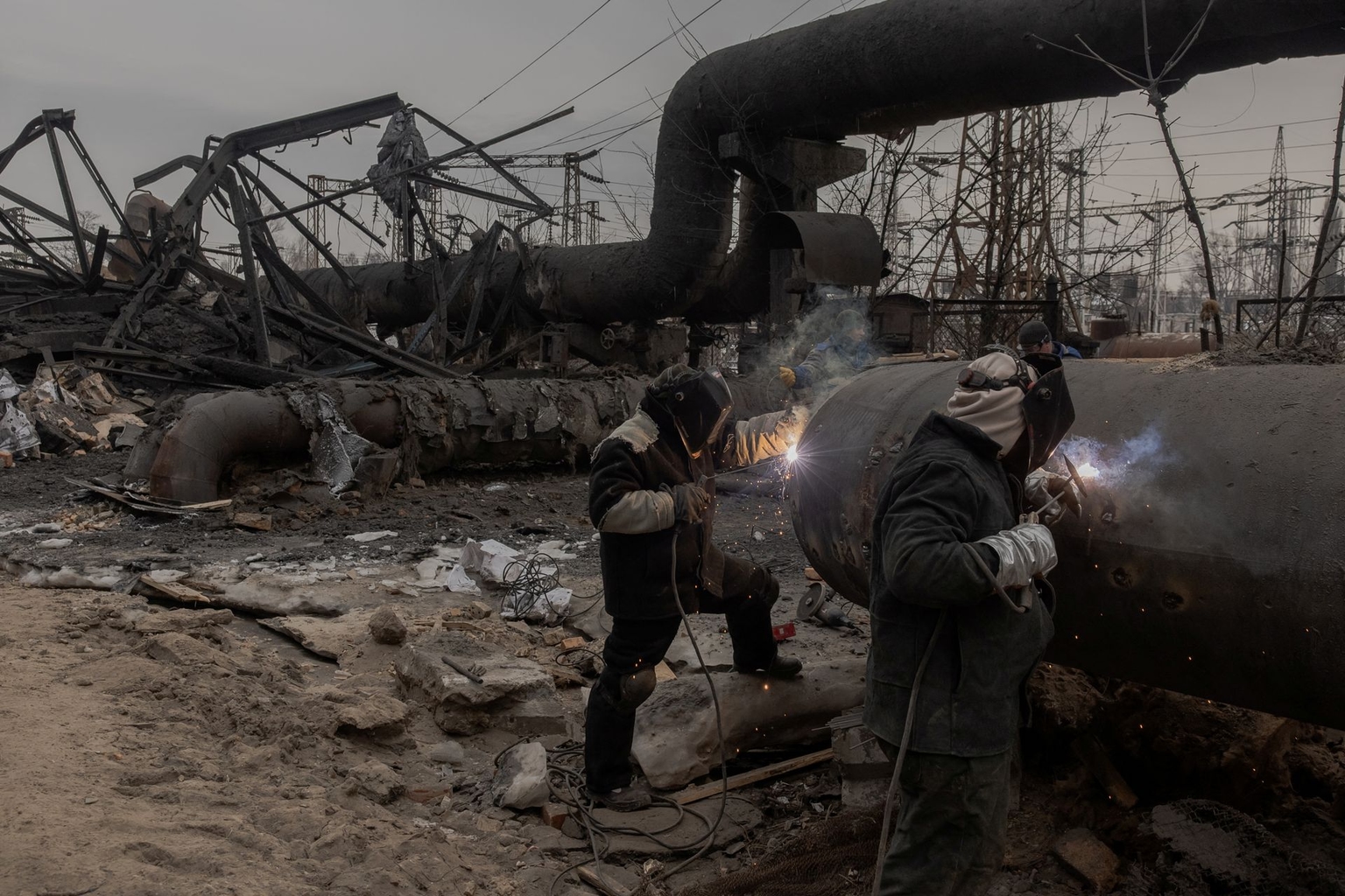 Employees repair sections of the Darnytska combined heat and power plant damaged by Russian airstrikes in Kyiv, Ukraine, on Feb. 4, 2026.
