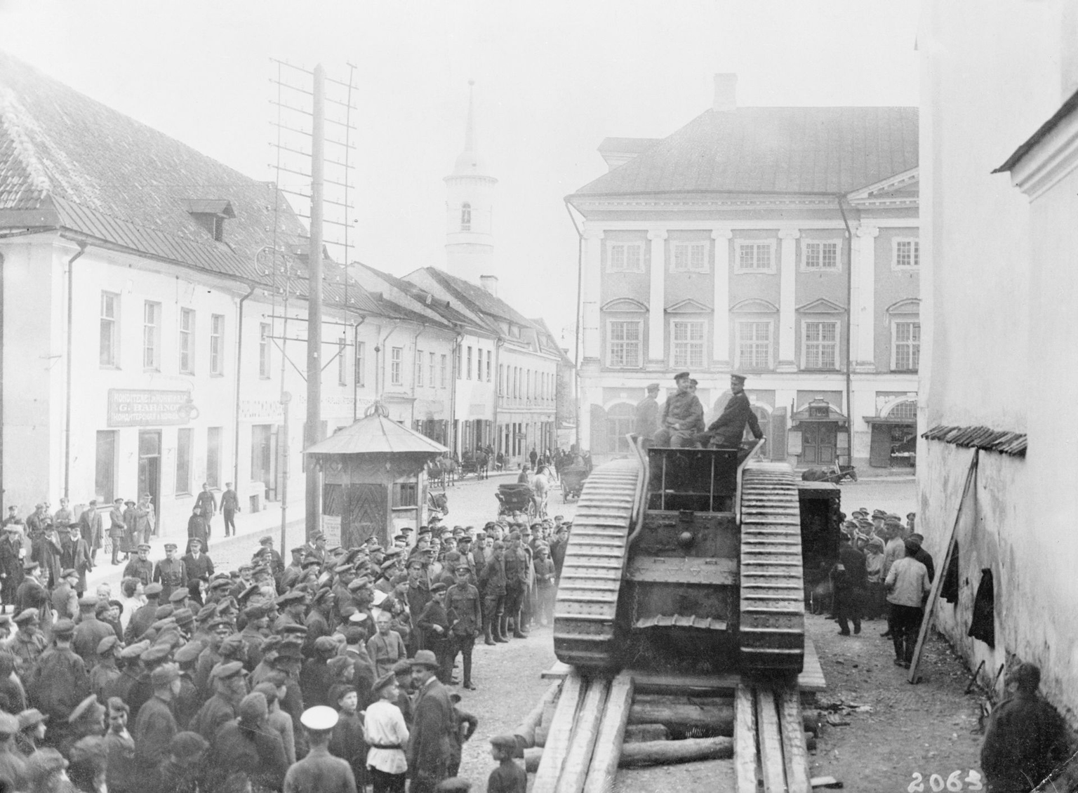 Men of Estonia's army are shown gathered around a tank in the marketplace in Estonia, on Sept. 27, 1939.
